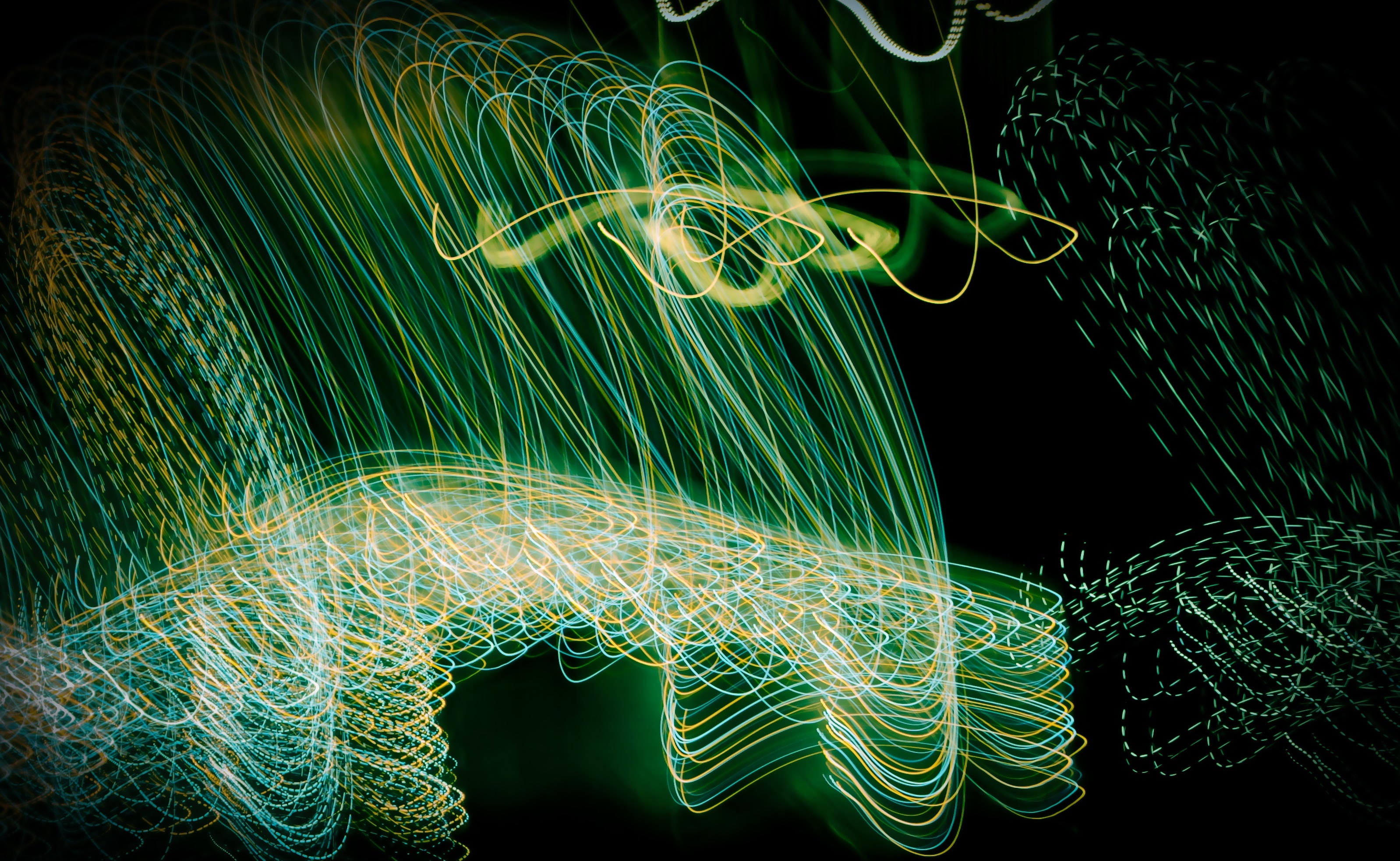 Abstract light trails in green and yellow HD Wallpaper