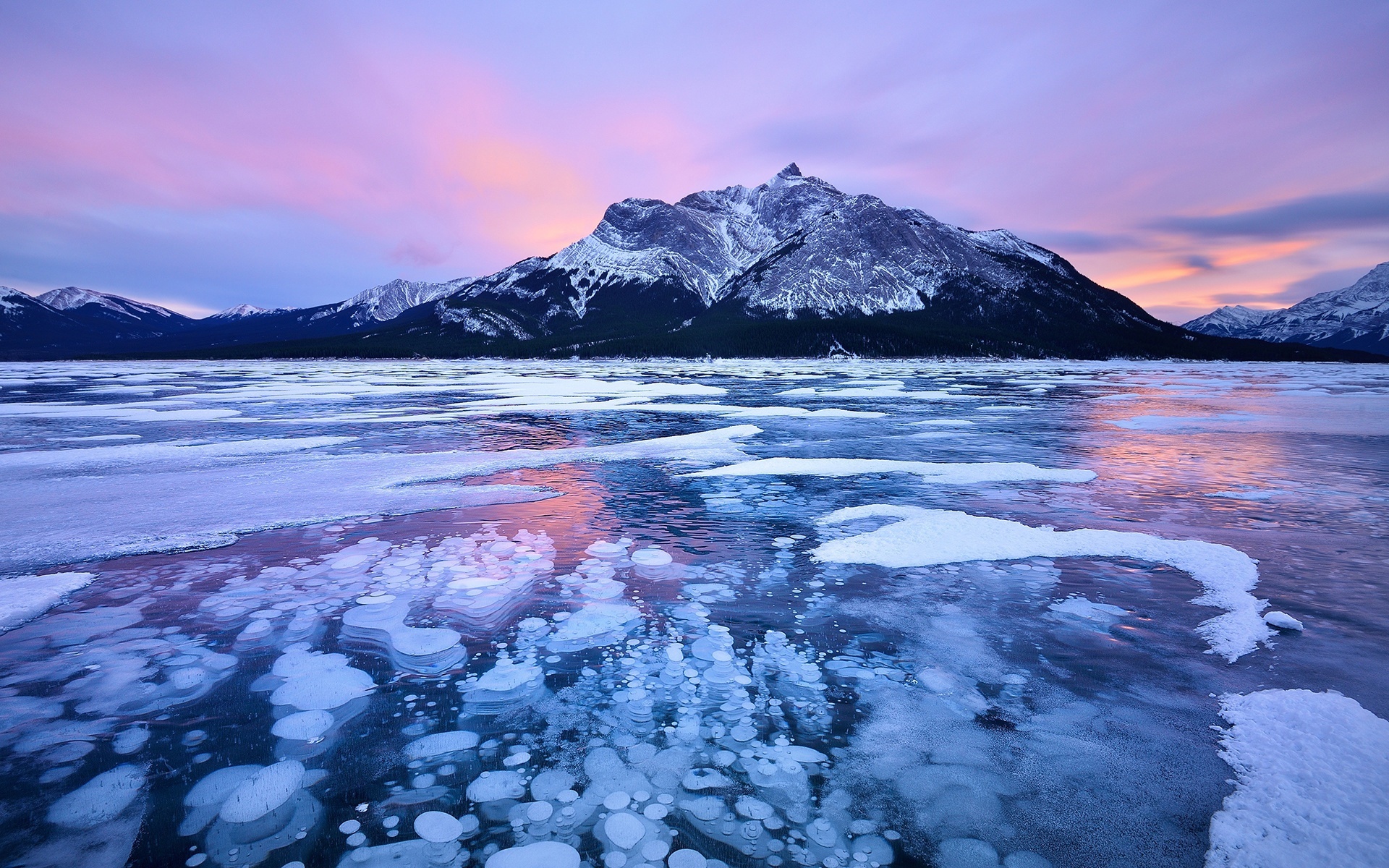 Frozen Lake with Bubbles and Mountain at Sunset HD Wallpaper