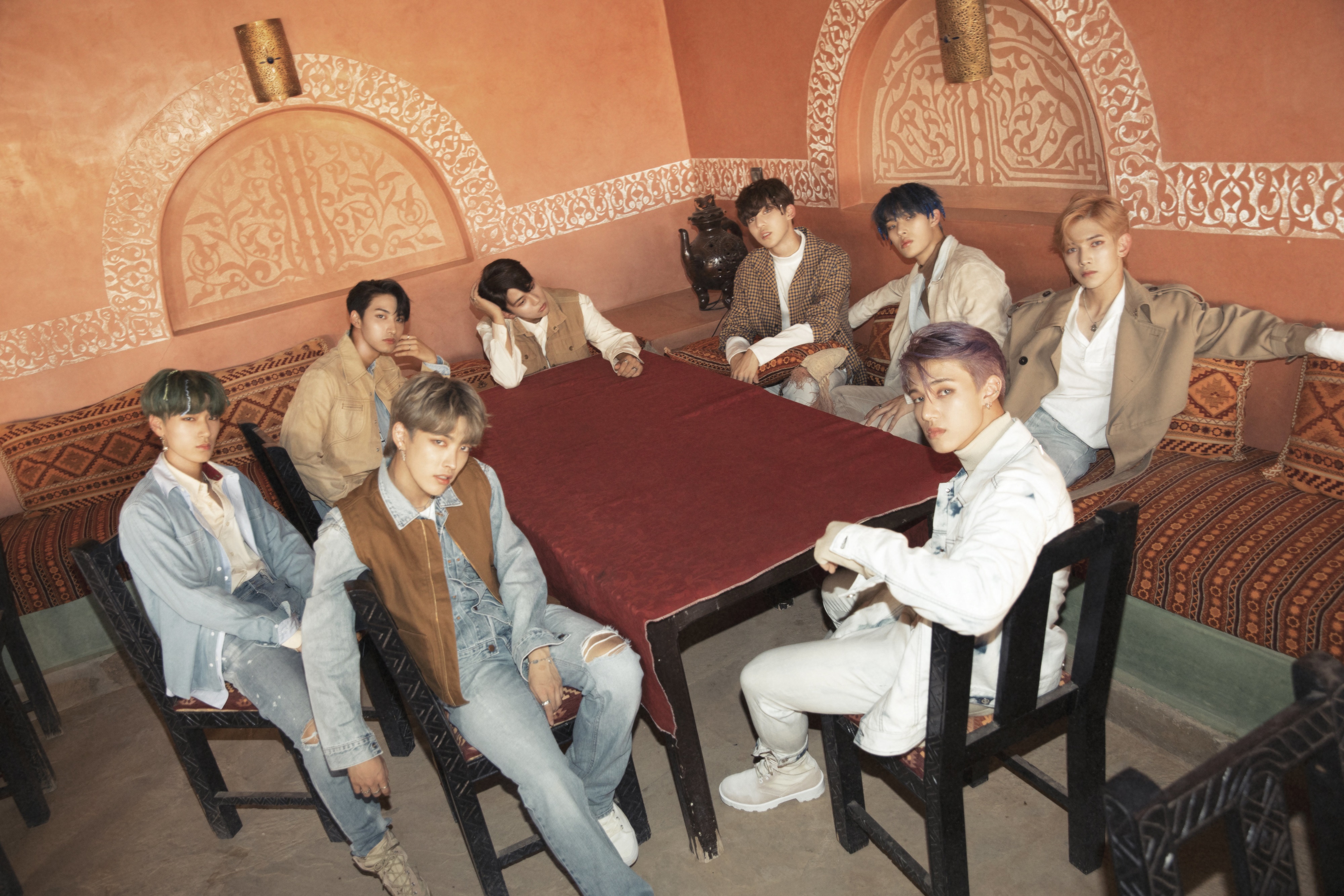 ATEEZ members in a room with Moroccan decor HD Wallpaper