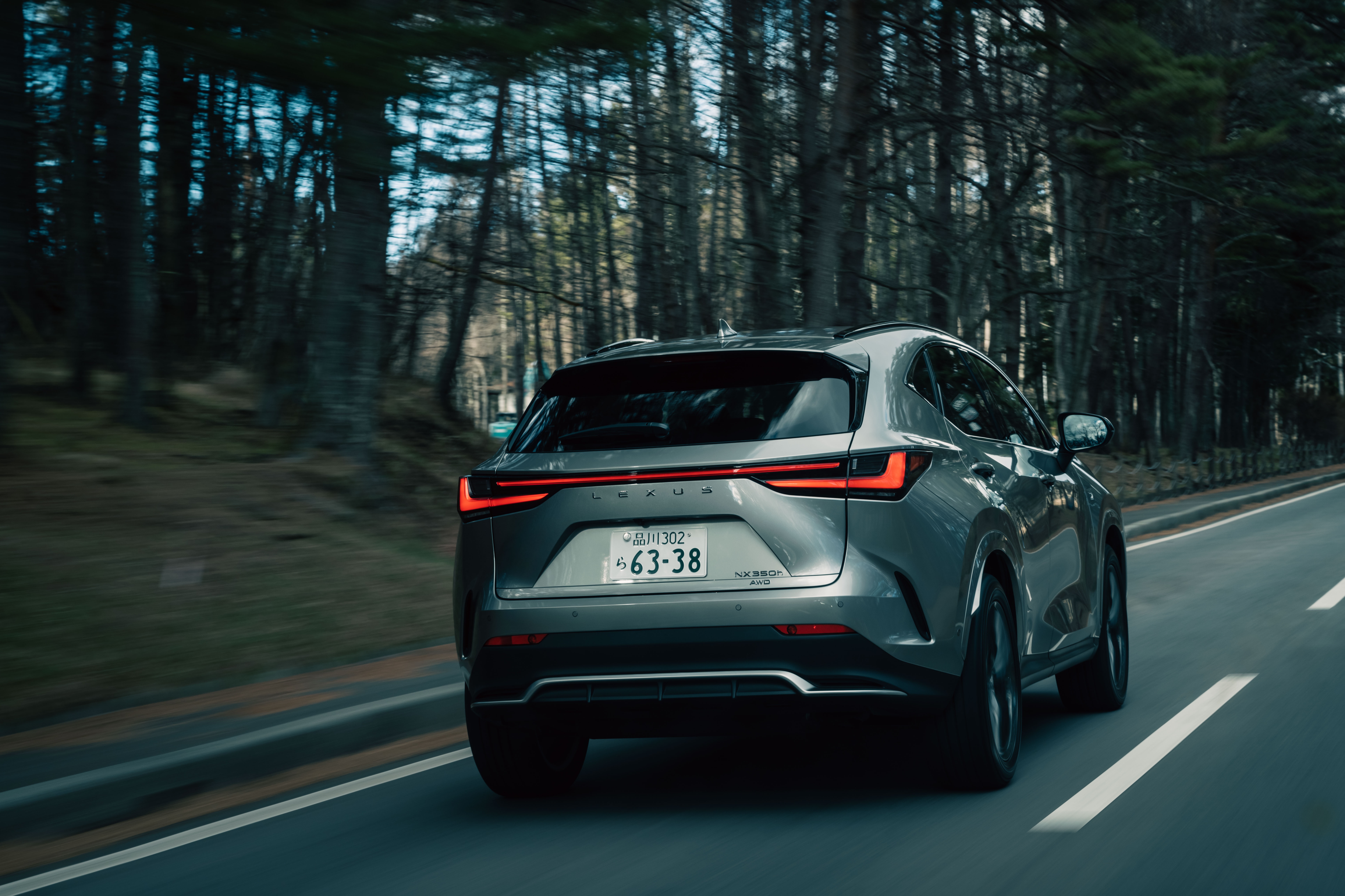Lexus NX 350 F SPORT driving on a forest road HD Wallpaper