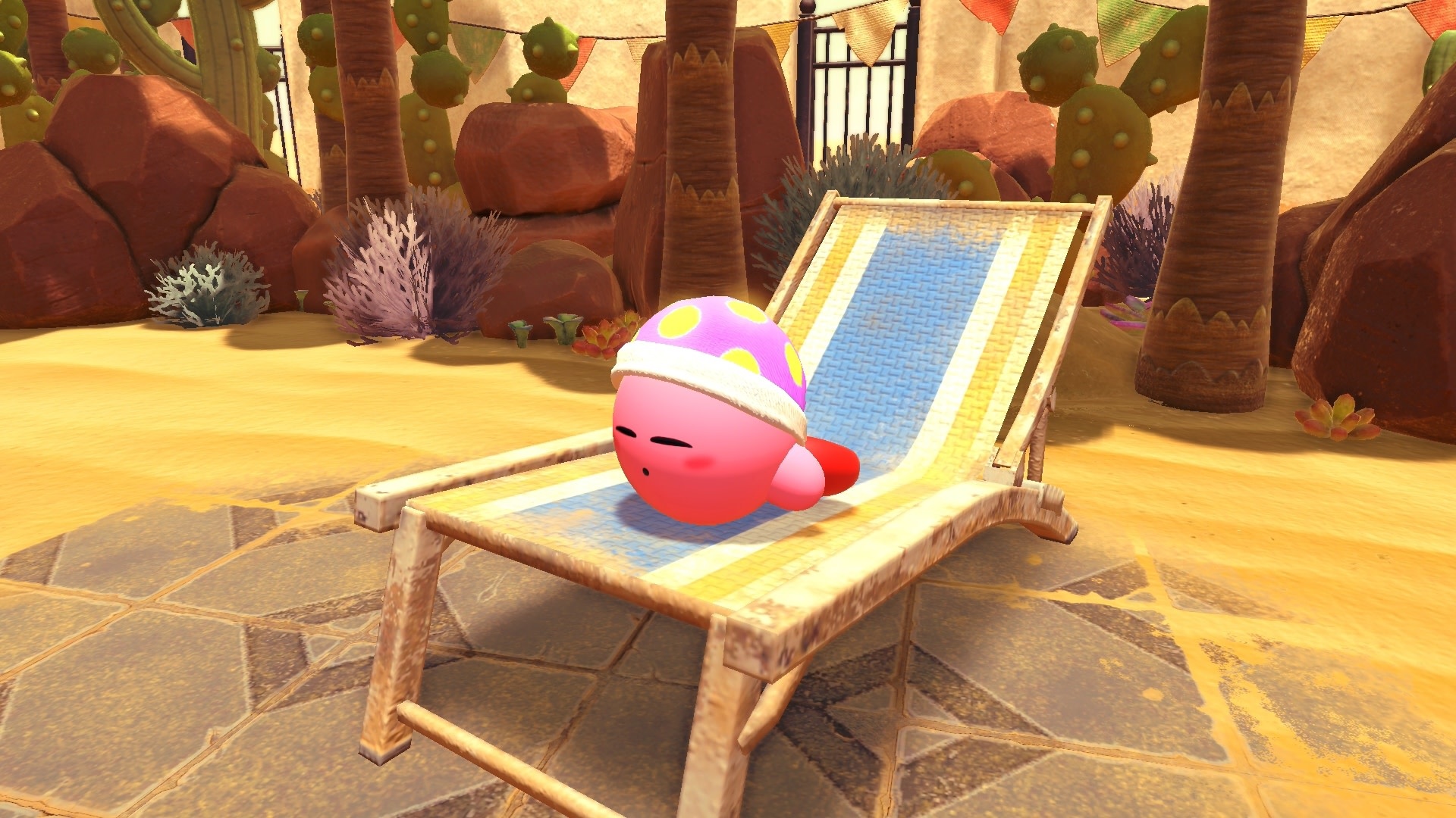 Kirby from Kirby and the Forgotten Land sleeping on a lounge chair HD Wallpaper