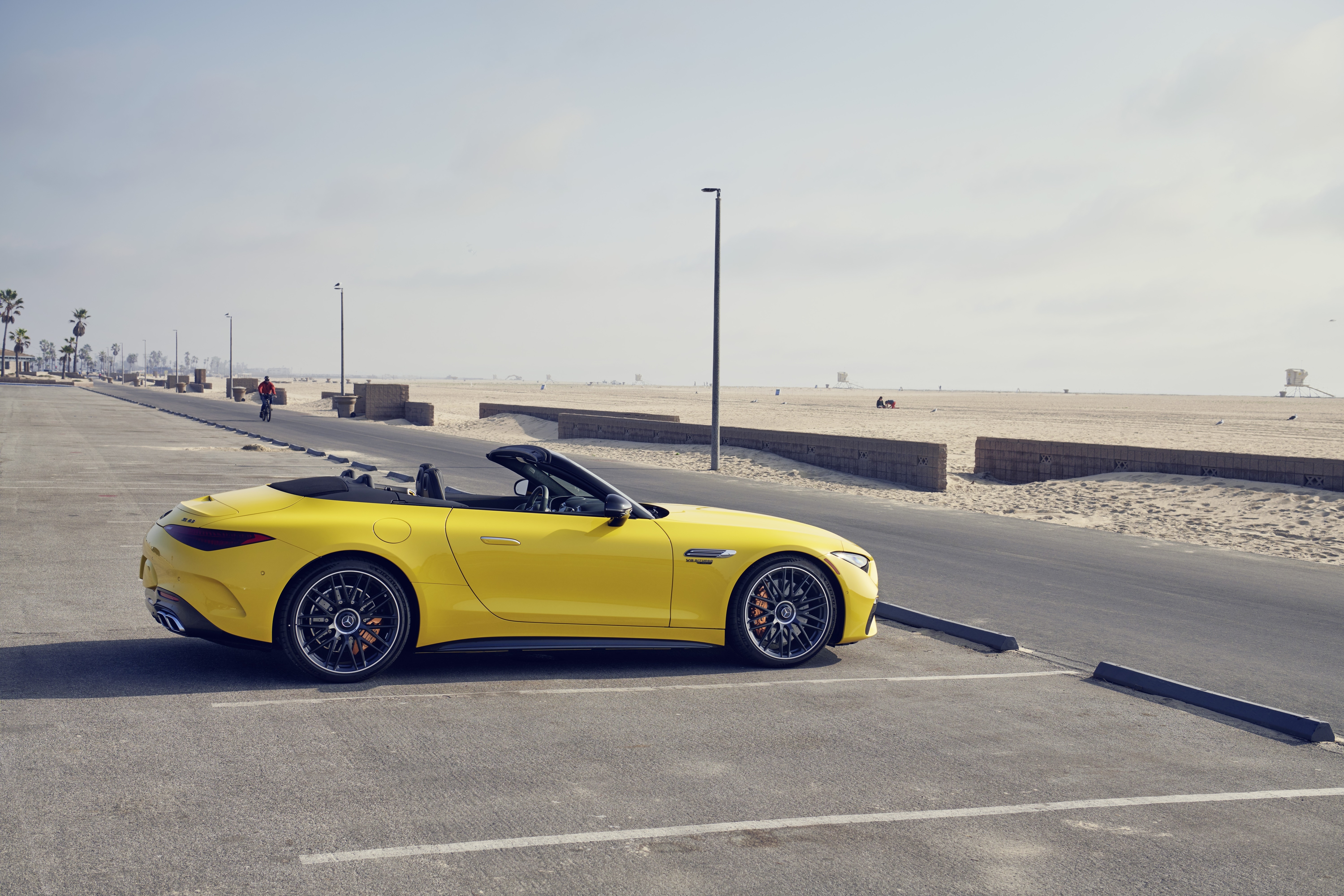 Yellow Mercedes-AMG SL Cabriolet parked by the beach HD Wallpaper