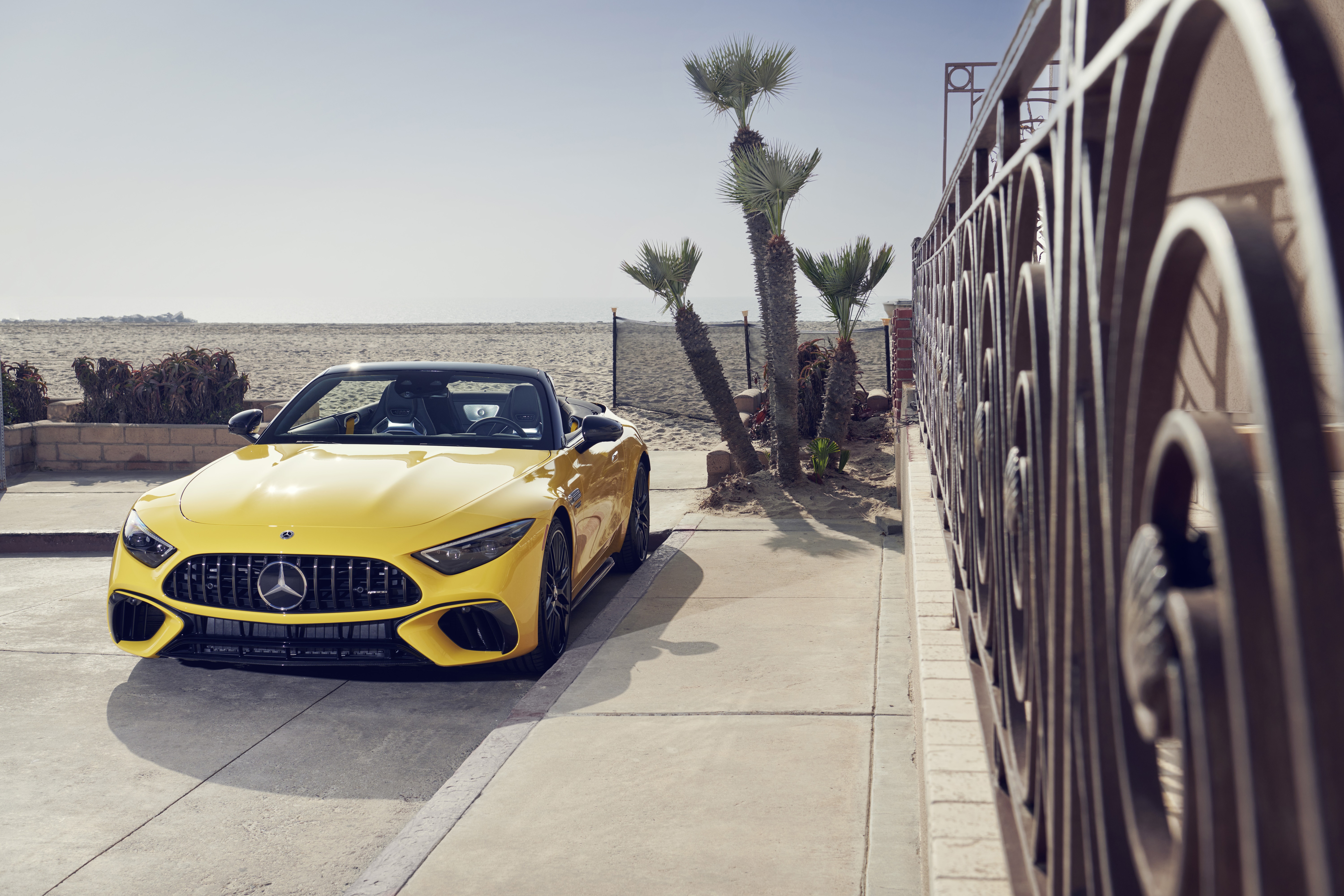 Yellow Mercedes-AMG SL Cabriolet by the beach HD Wallpaper