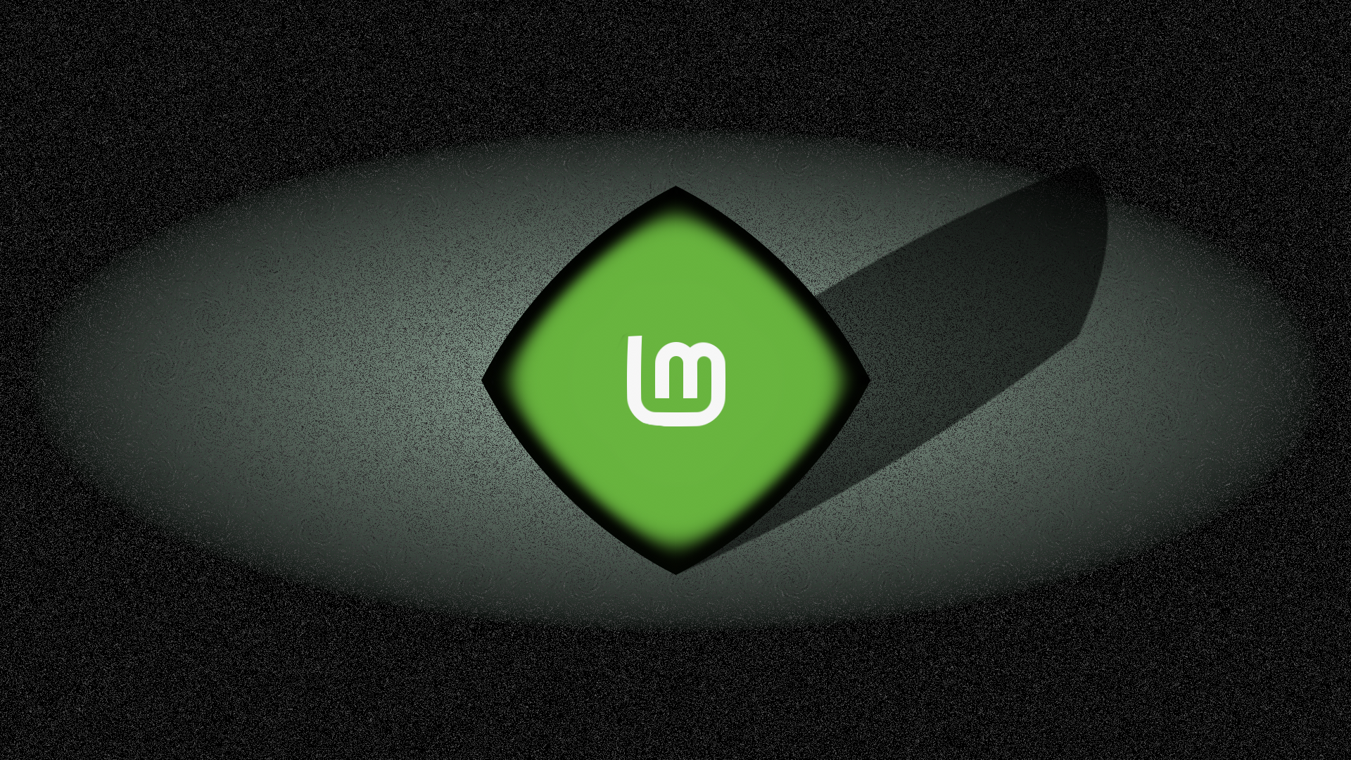 Linux Mint logo on a spotlighted surface HD Wallpaper