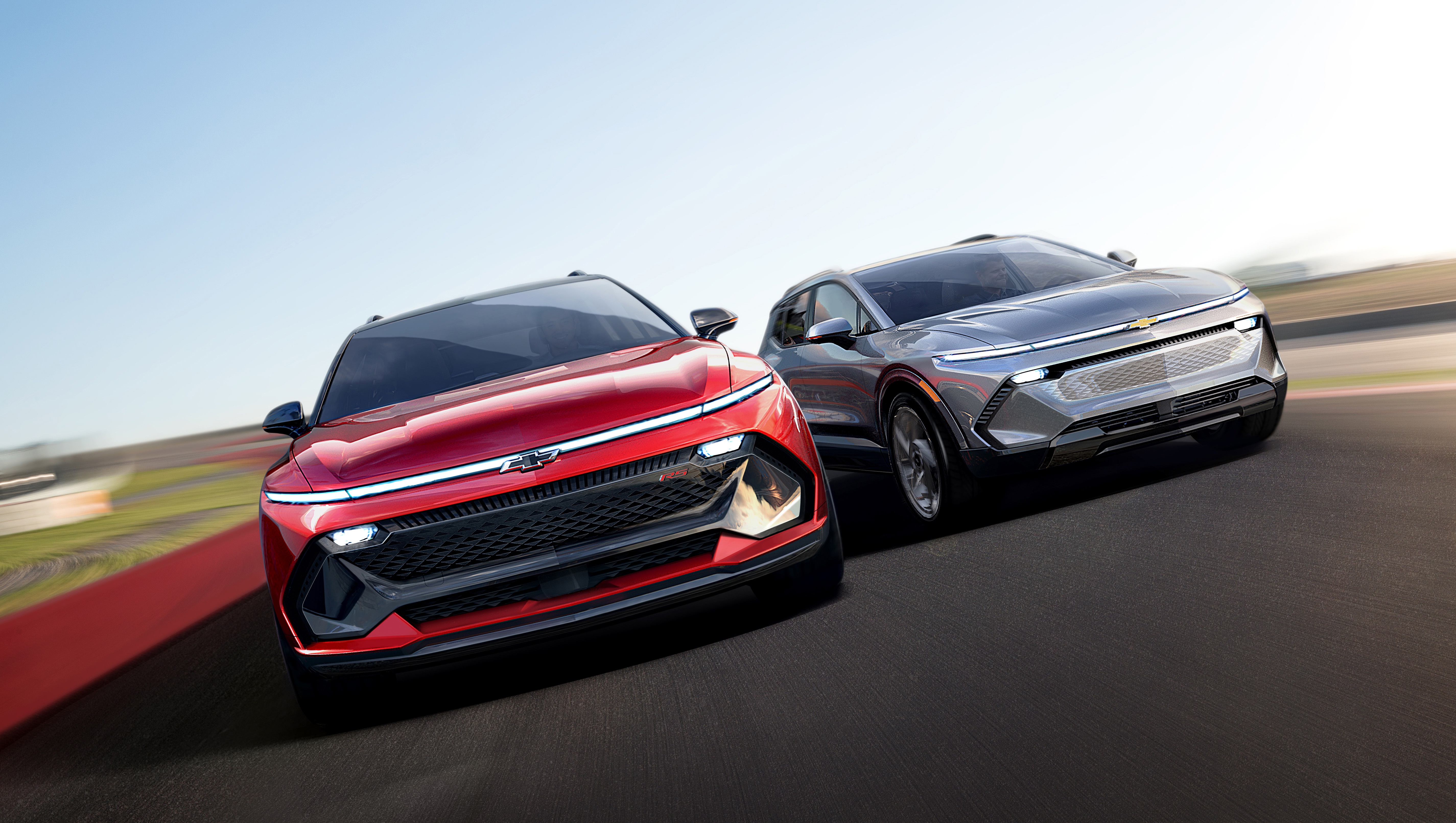 2024 Chevrolet Equinox EV electric SUVs on a racetrack HD Wallpaper