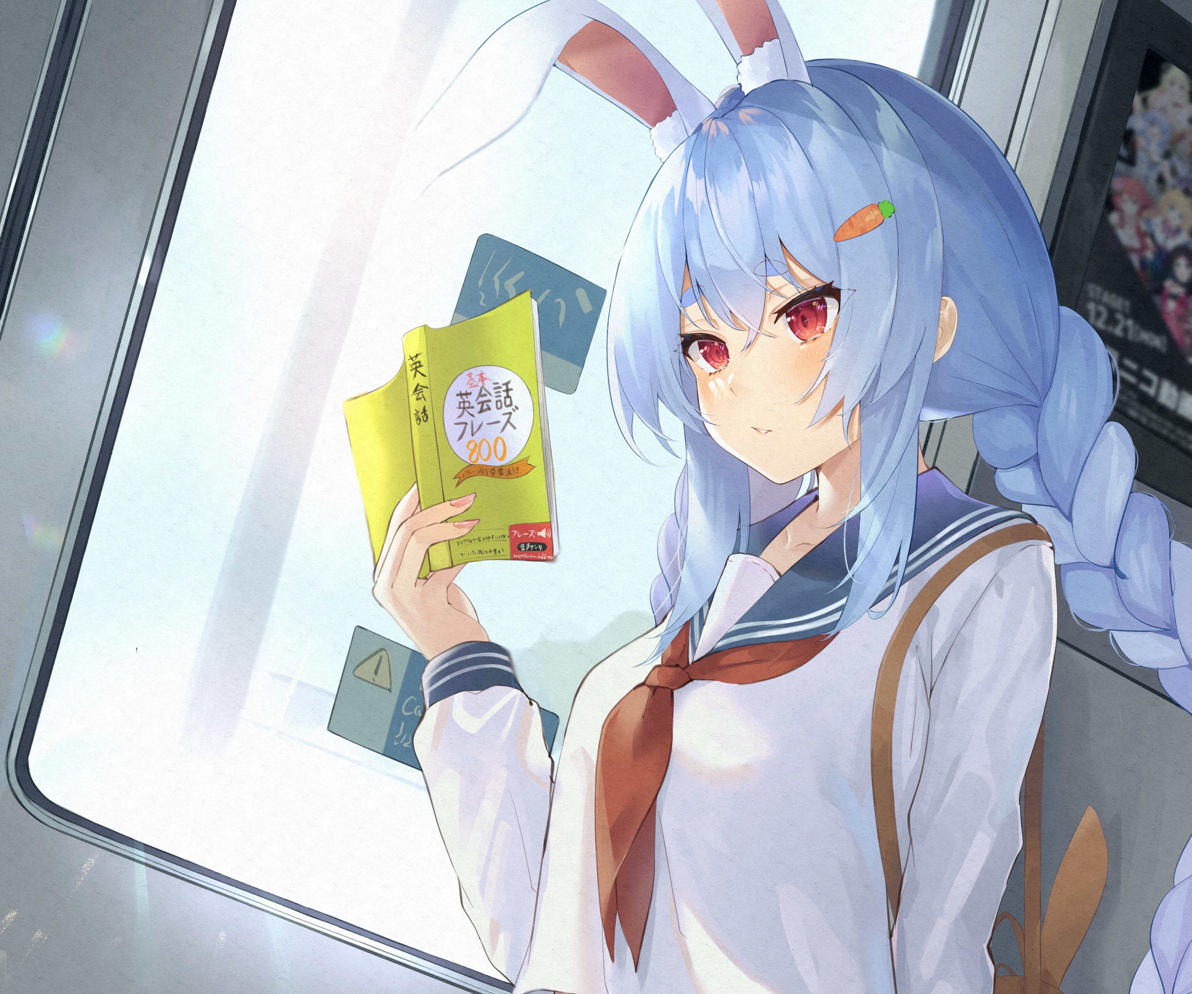 Usada Pekora from Hololive reading a book on a train HD Wallpaper