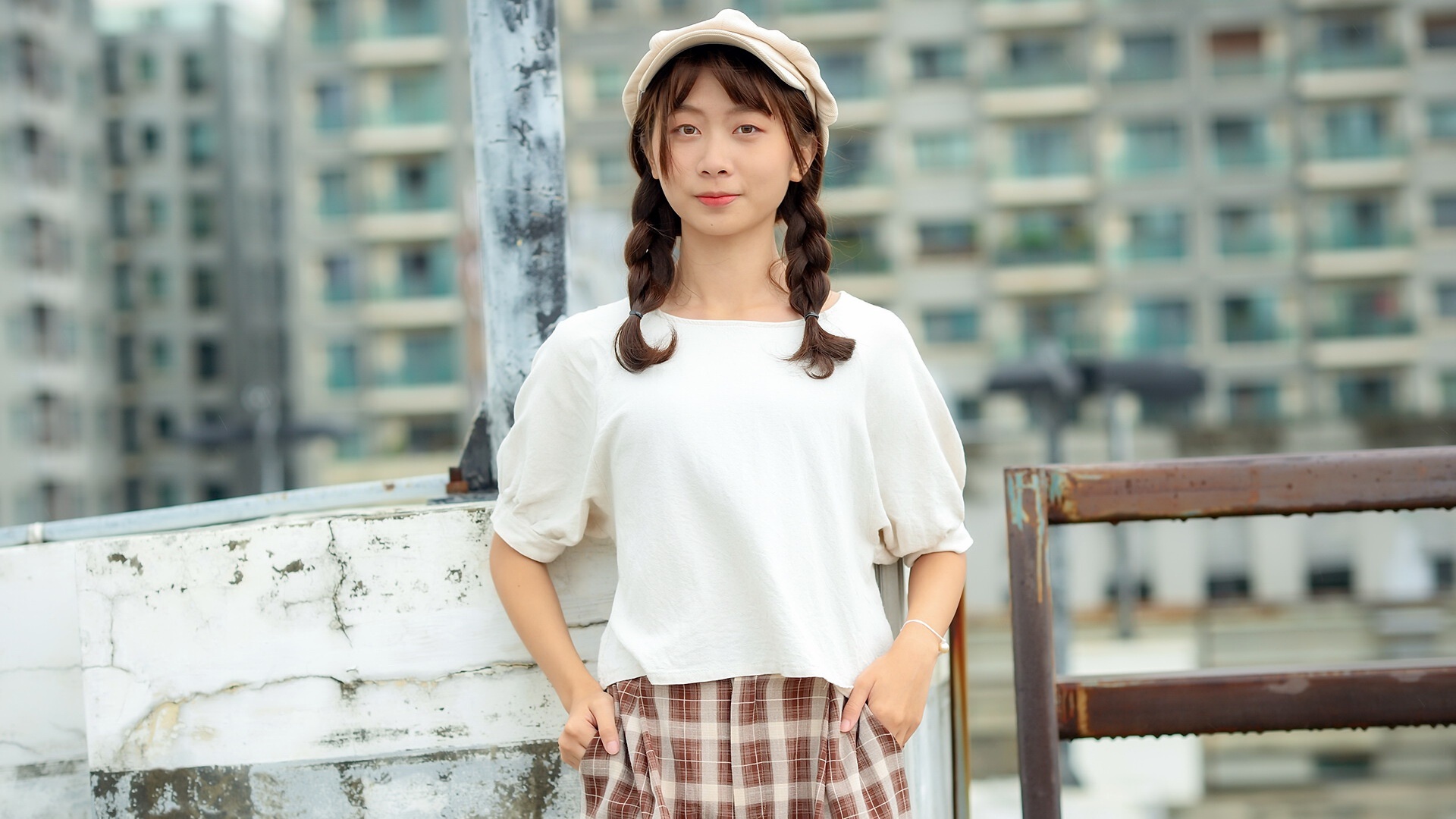 Young Asian woman with pigtails wearing a beret and plaid skirt HD Wallpaper