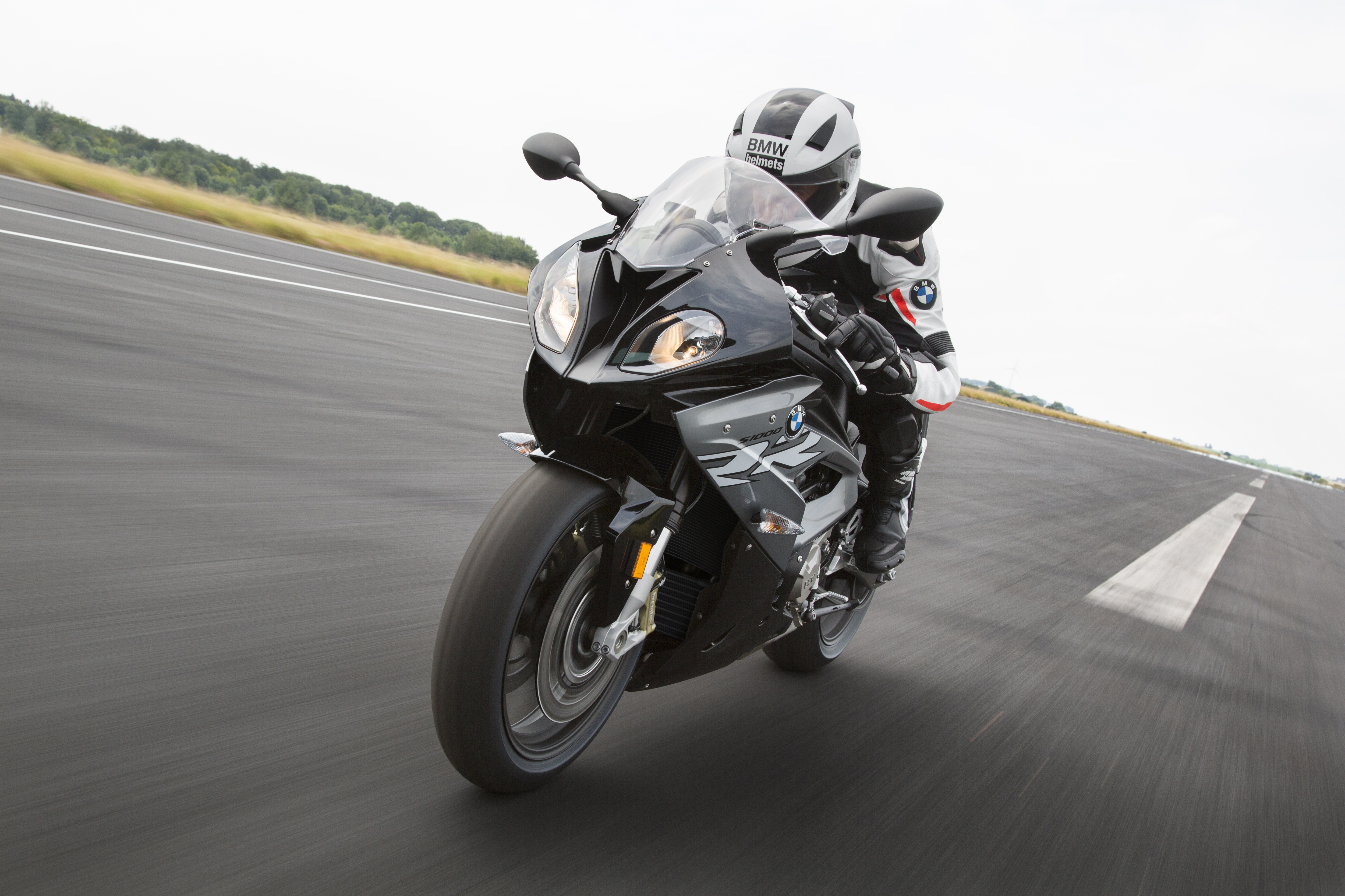BMW S1000RR motorcycle on a racetrack HD Wallpaper