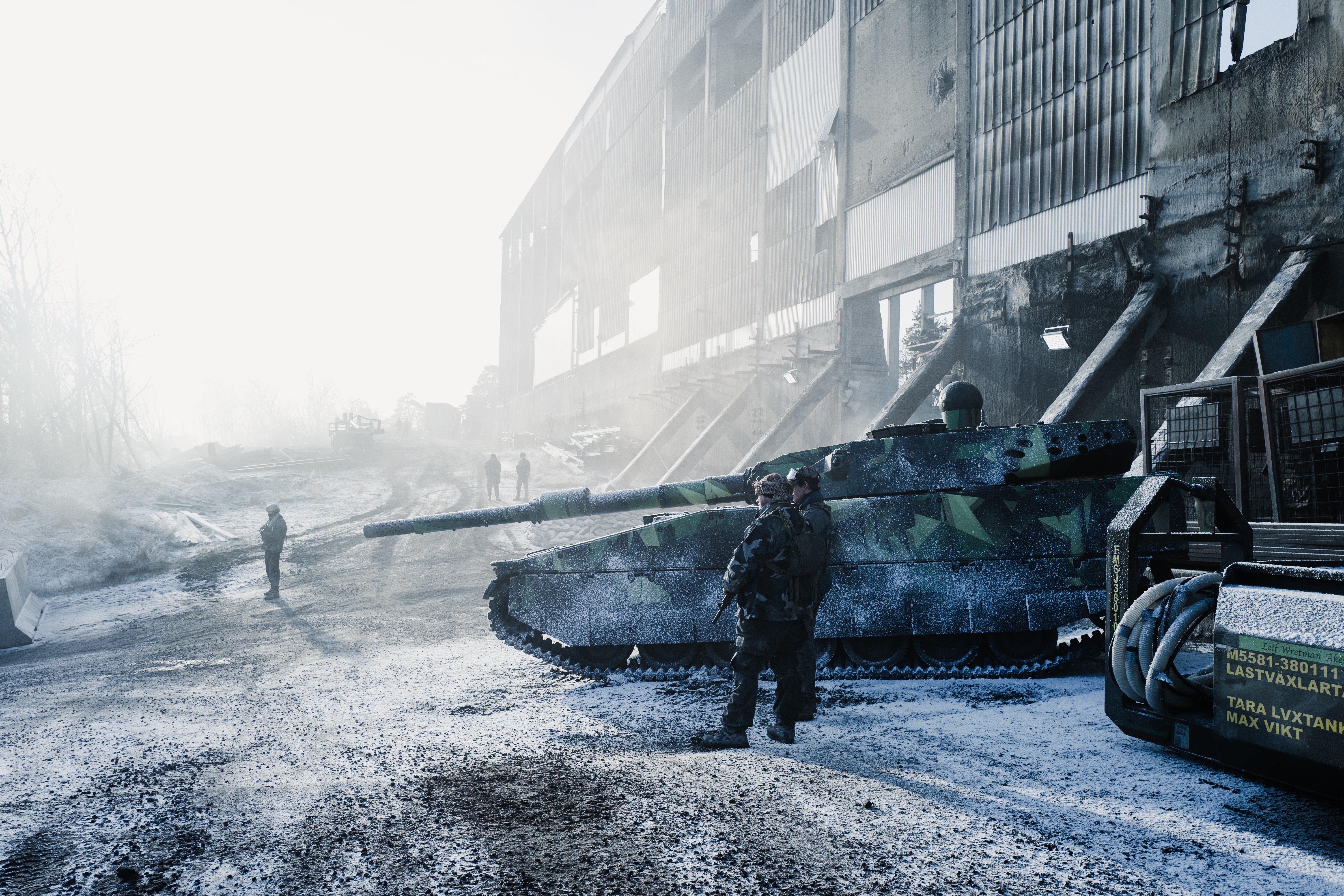Soldiers and Tank in Snowy Industrial Area 4K HD Wallpaper