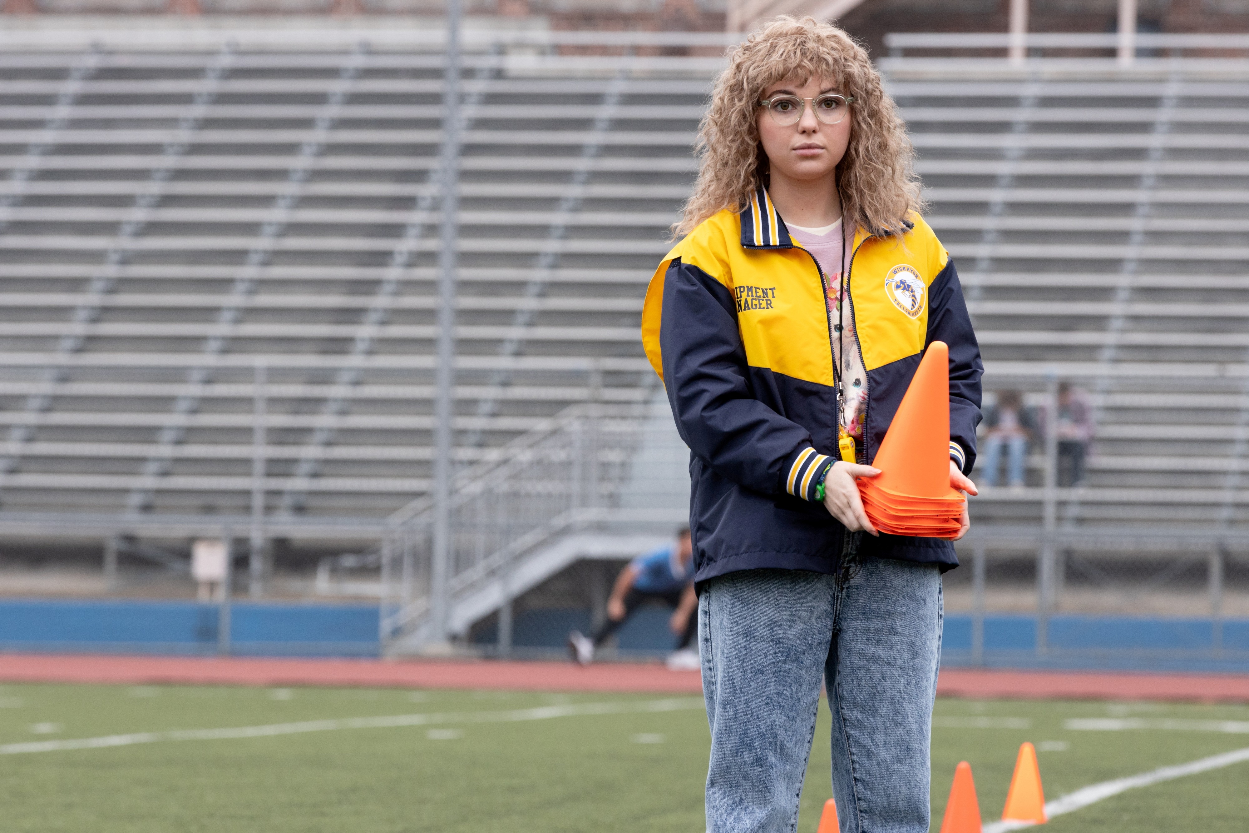 Shauna from Yellowjackets holding orange cones HD Wallpaper