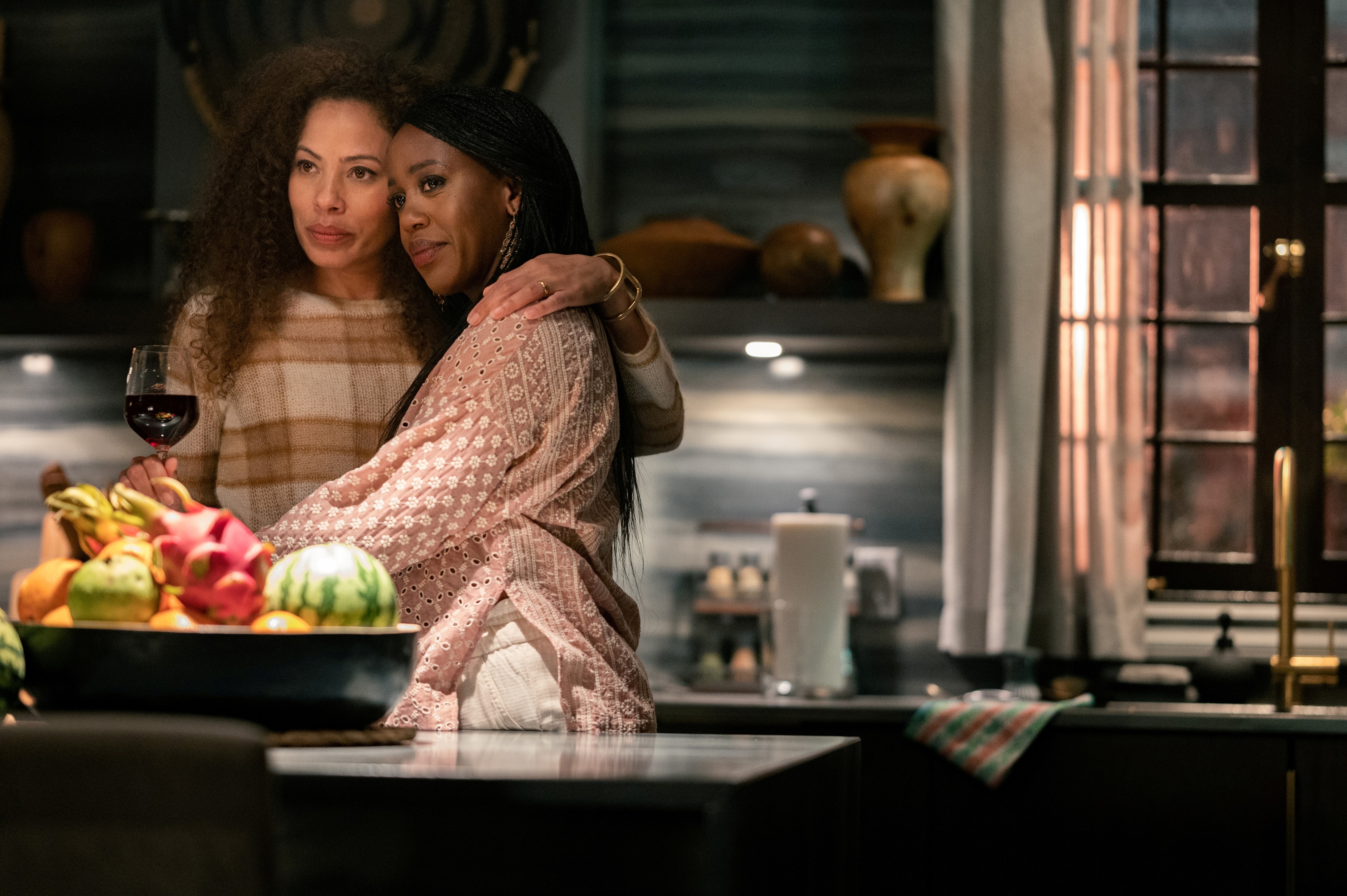 Two women in a kitchen HD Wallpaper
