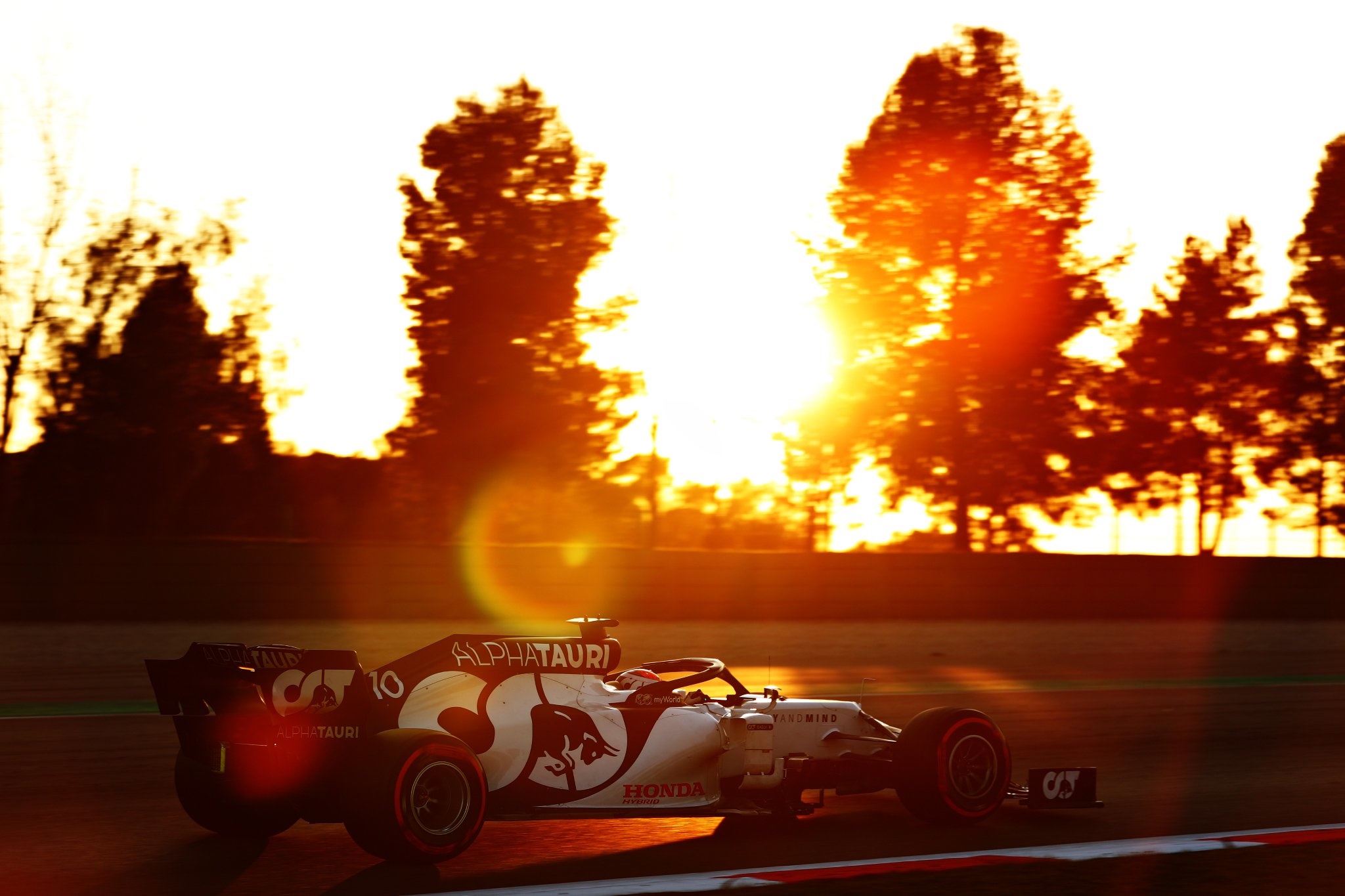 Scuderia AlphaTauri Formula 1 car at sunset HD Wallpaper
