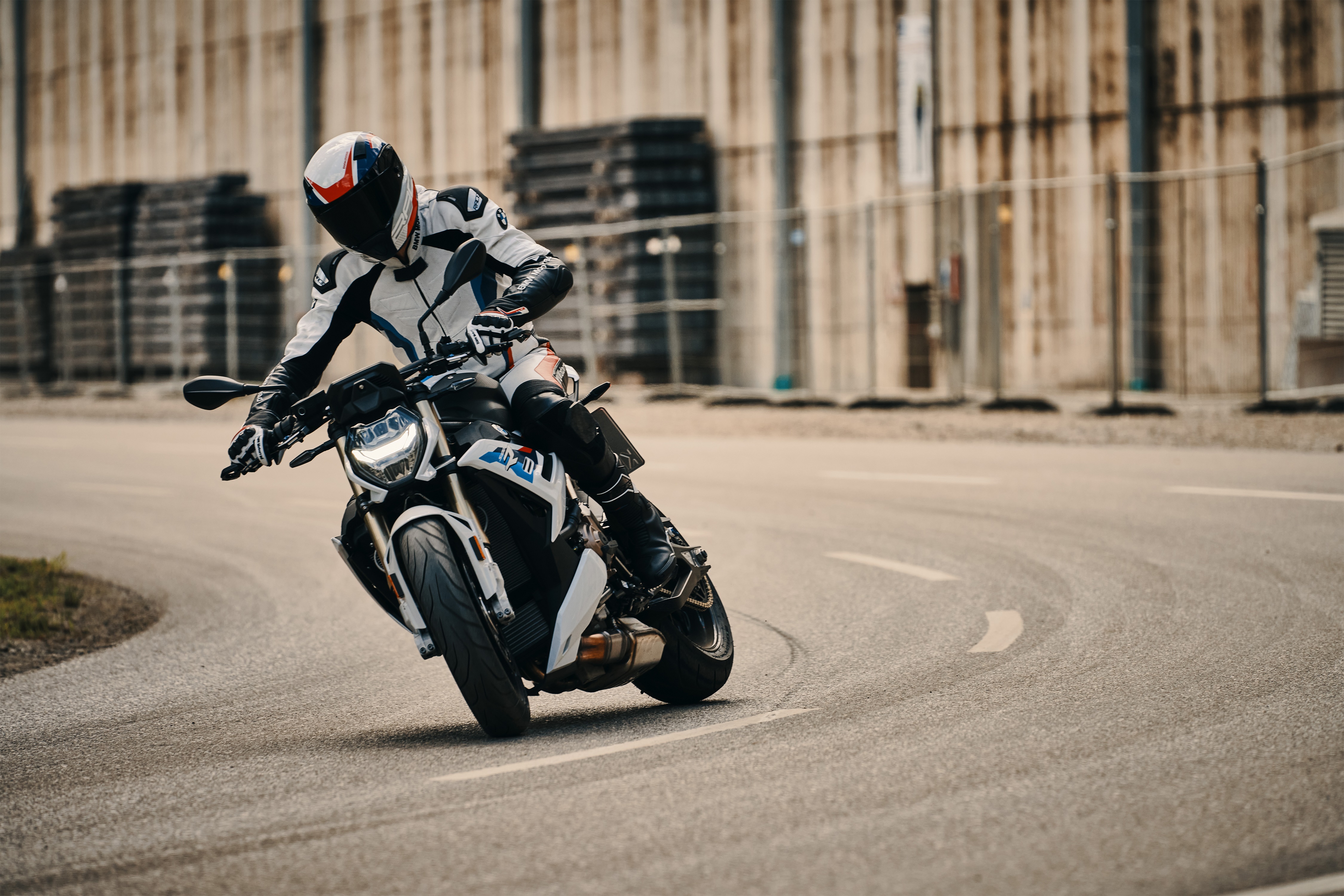 BMW S1000R motorcycle rider on a road HD Wallpaper