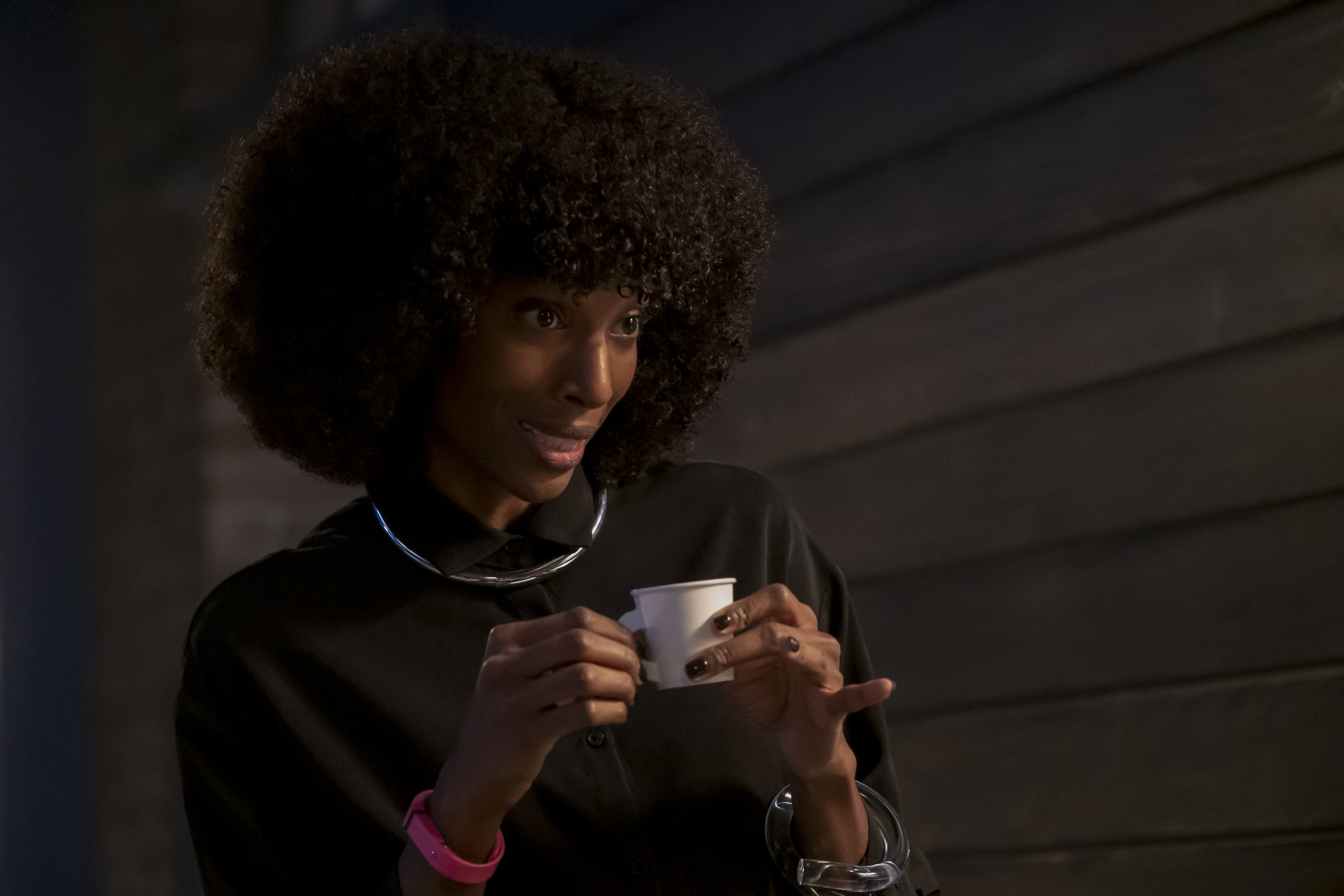 Zainab Johnson holding a cup HD Wallpaper