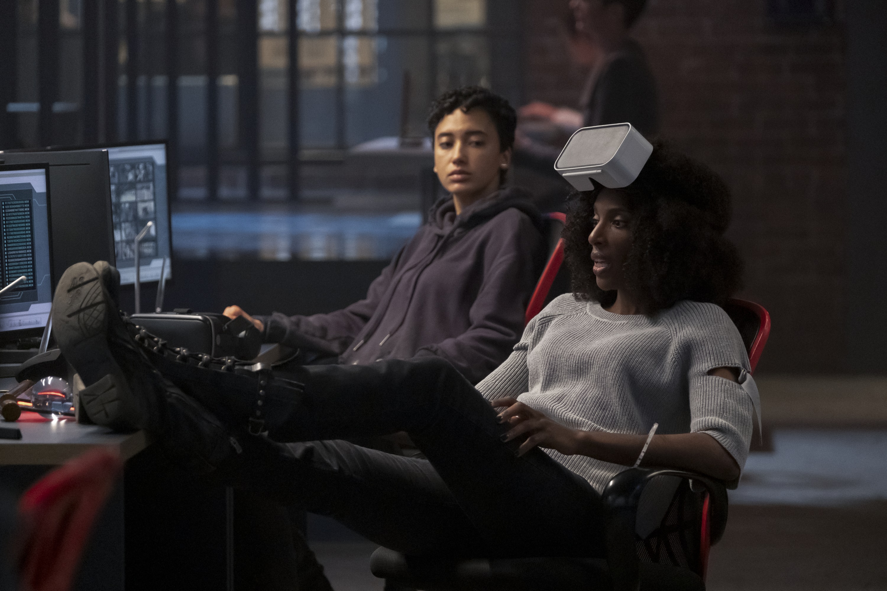 Zainab Johnson and Andy Allo in a dark room HD Wallpaper