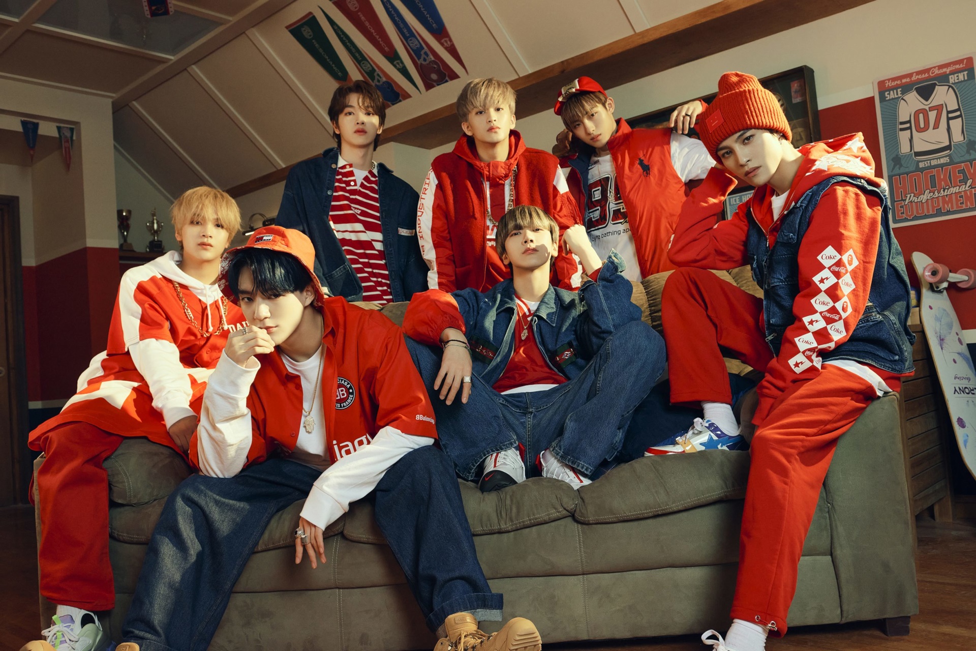 NCT members in red and blue sporty outfits HD Wallpaper
