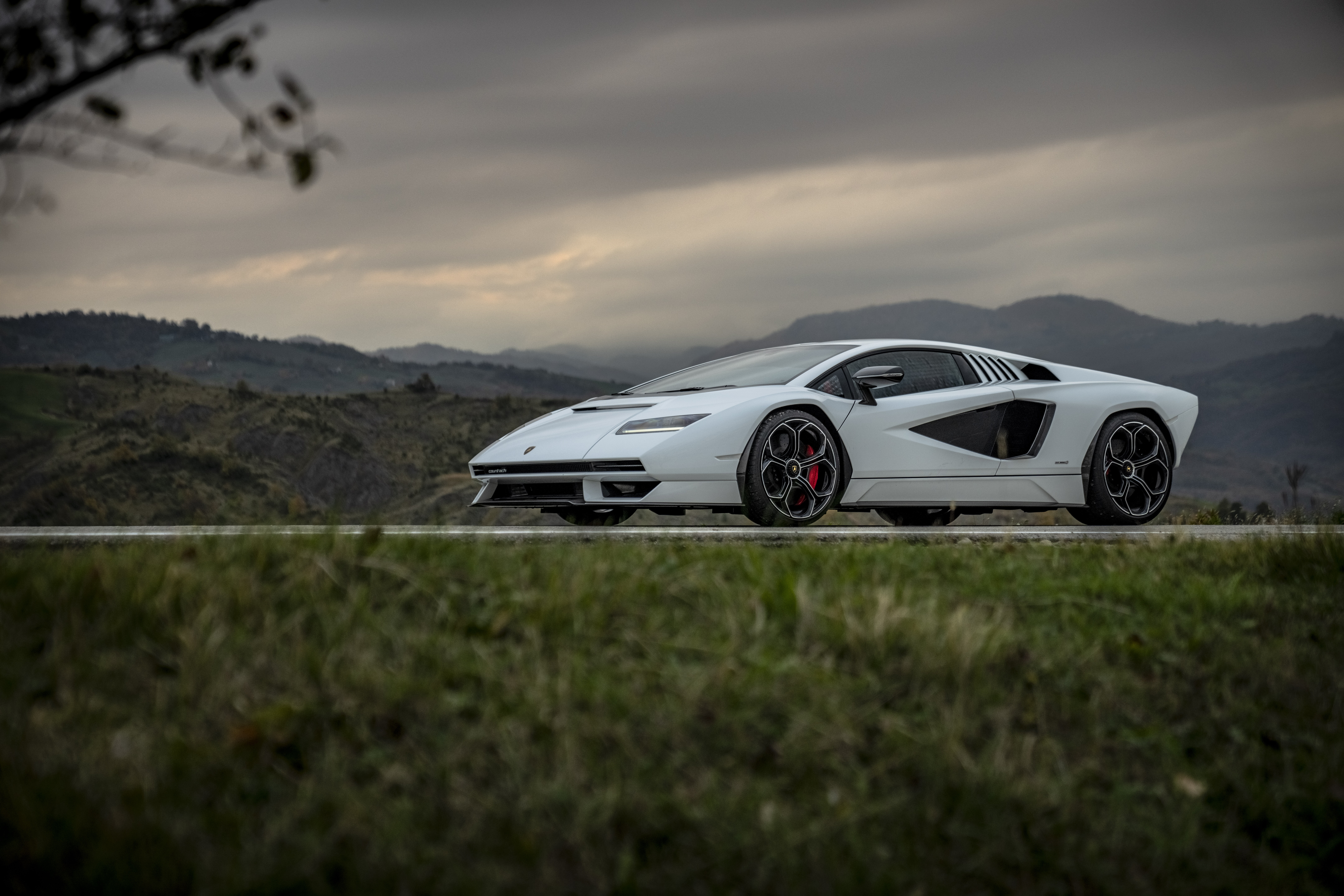 White Lamborghini Countach LPI 800-4 on a road HD Wallpaper