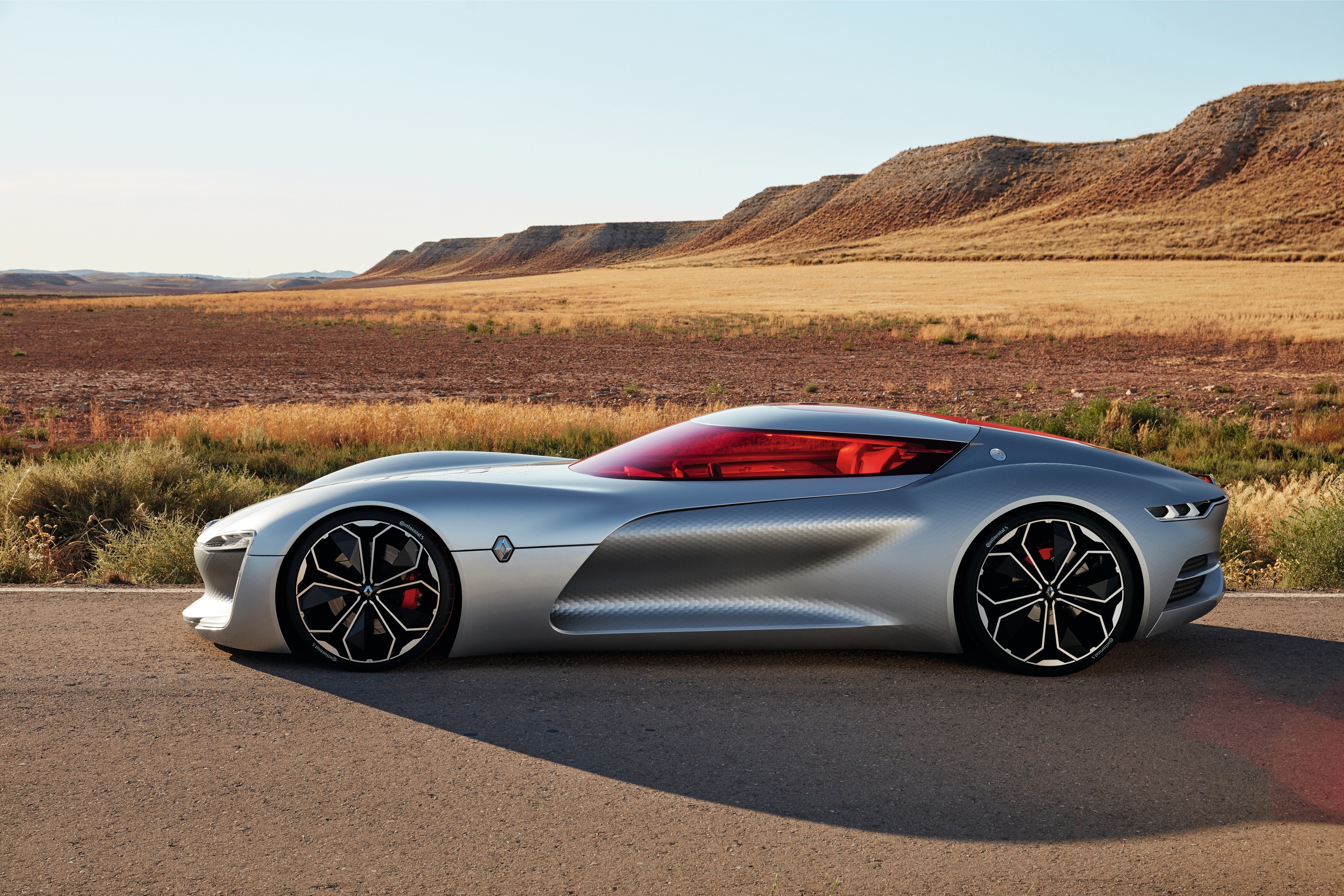 Renault Trezor concept car in a desert landscape HD Wallpaper