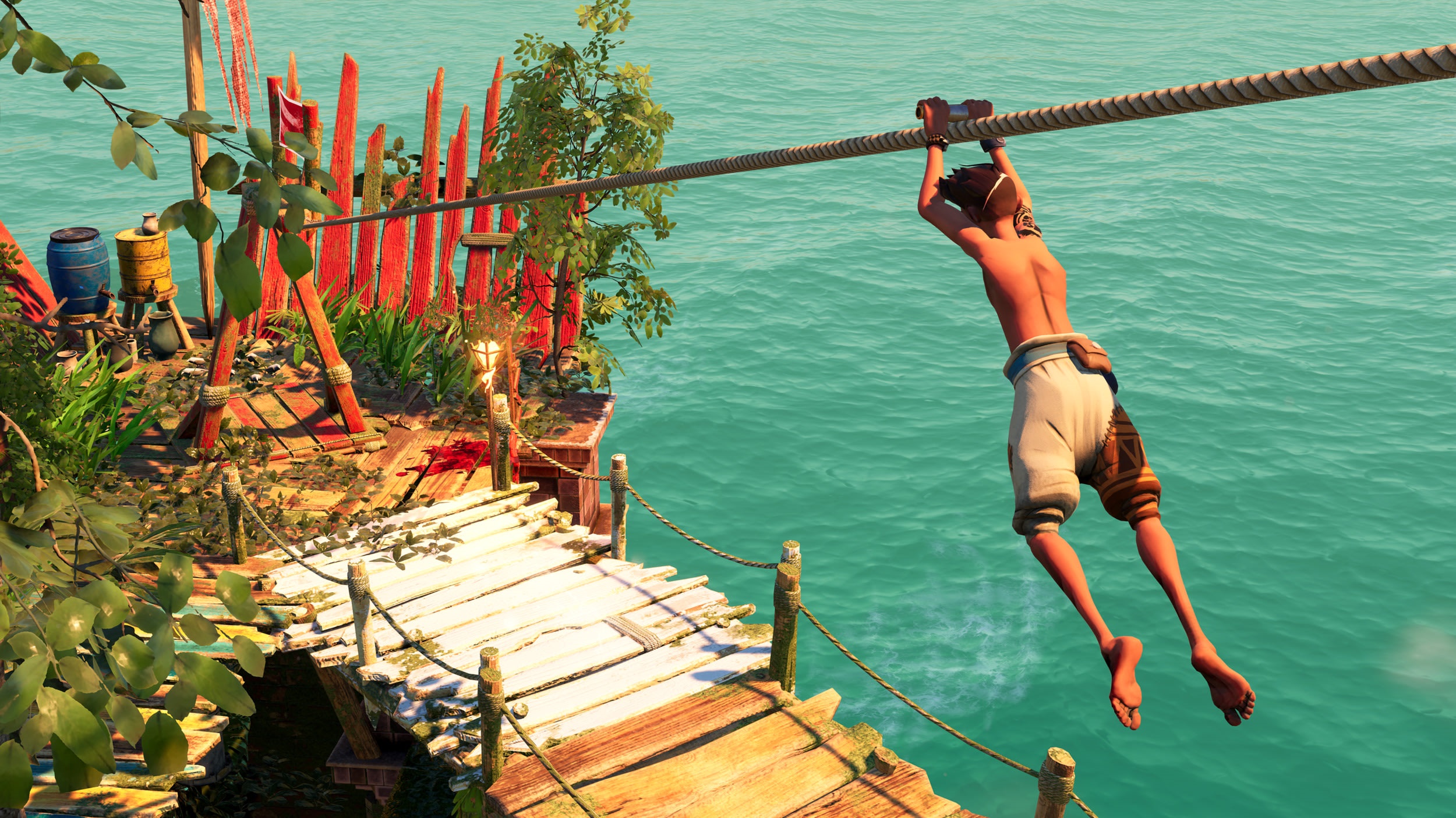 Boy ziplining over turquoise water near wooden structures HD Wallpaper