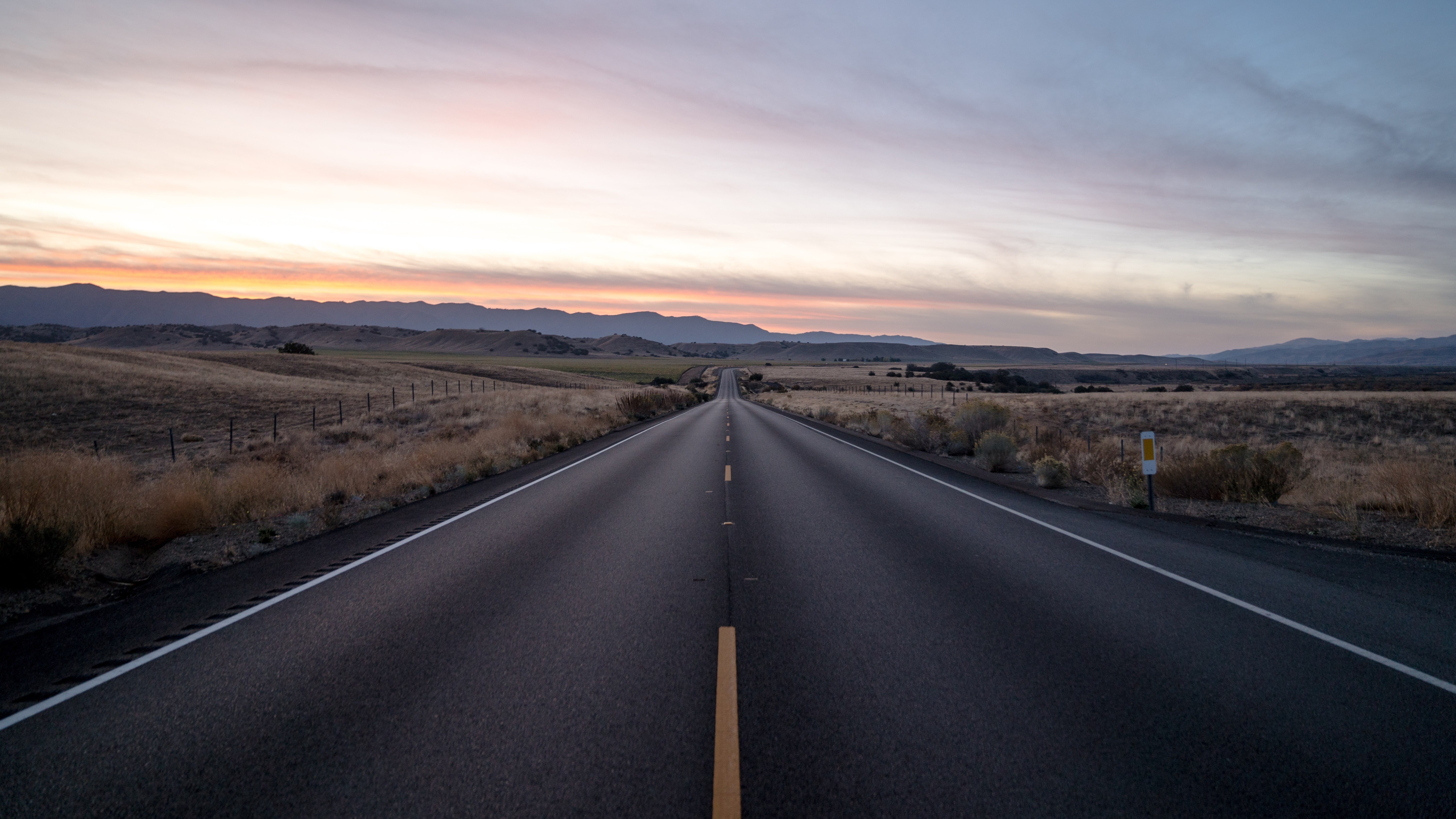 Road in the countryside at sunset 4K HD Wallpaper