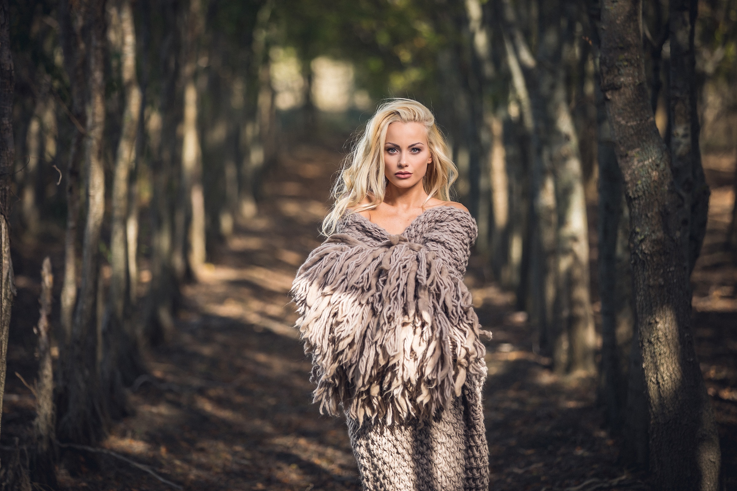 Woman in a knitted shawl in a forest HD Wallpaper