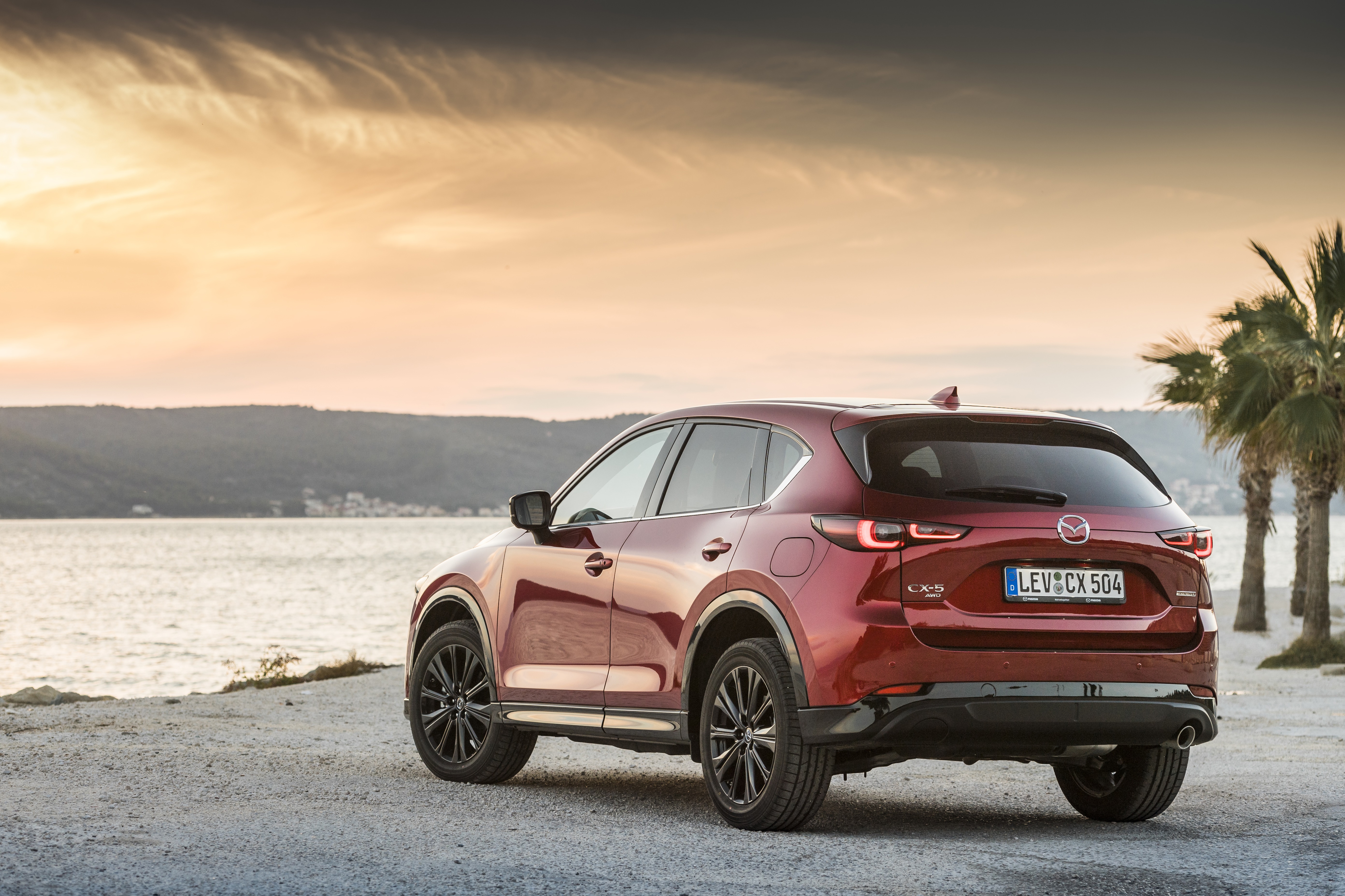 Red Mazda CX-5 Skyactiv-D 4K parked by the sea HD Wallpaper
