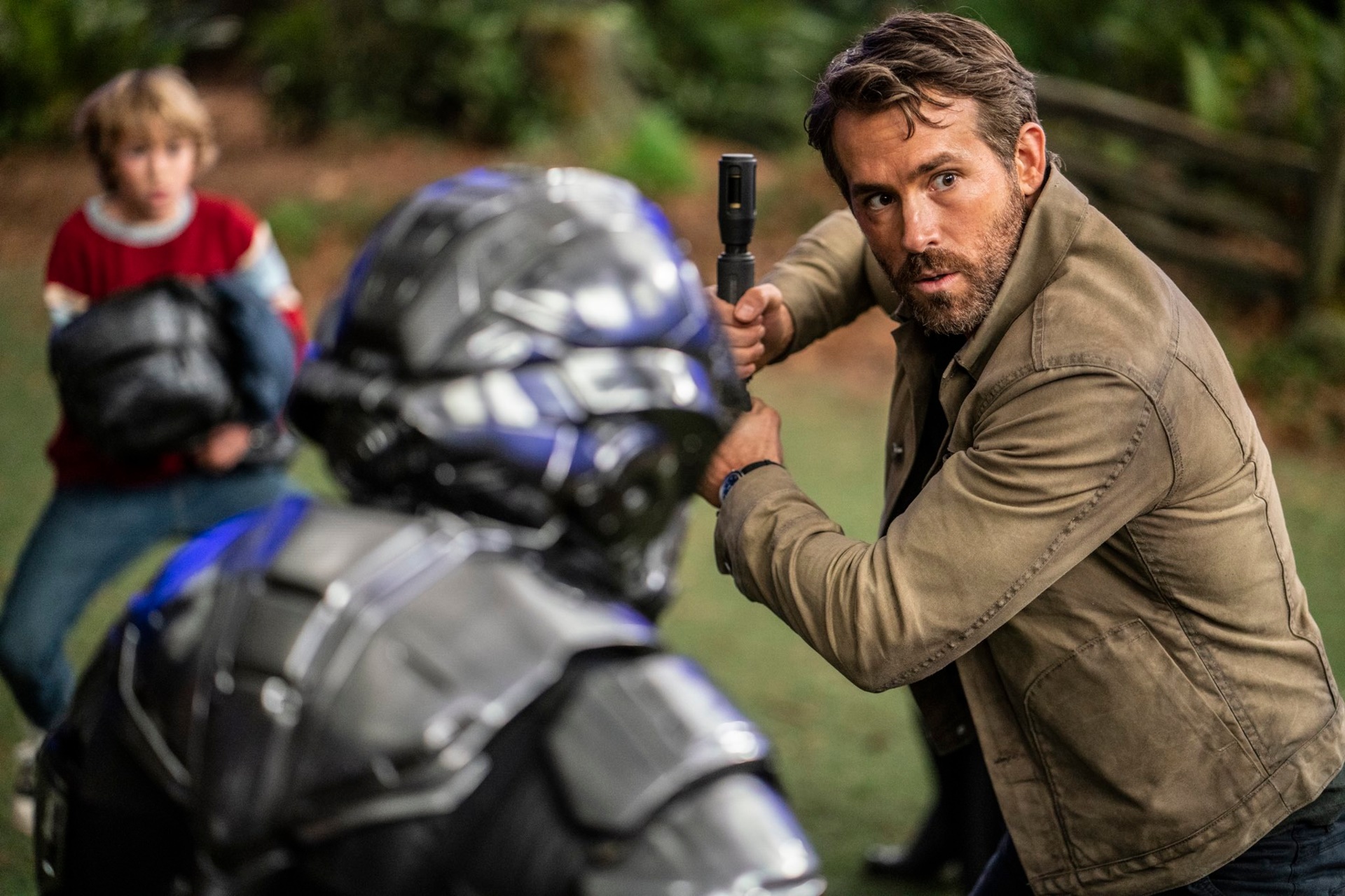 Ryan Reynolds and two children in The Adam Project HD Wallpaper