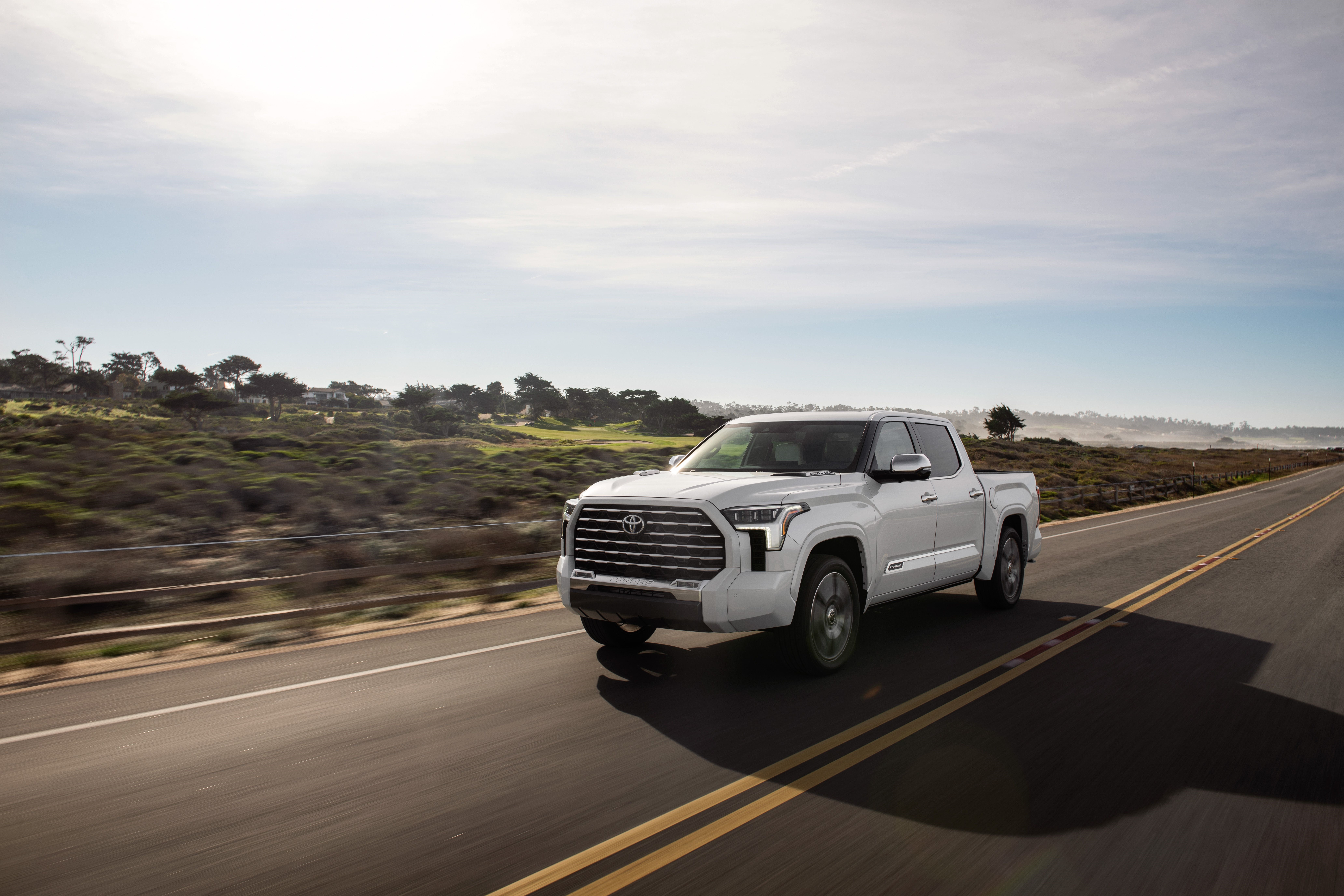 White Toyota Tundra Capstone CrewMax driving on road HD Wallpaper