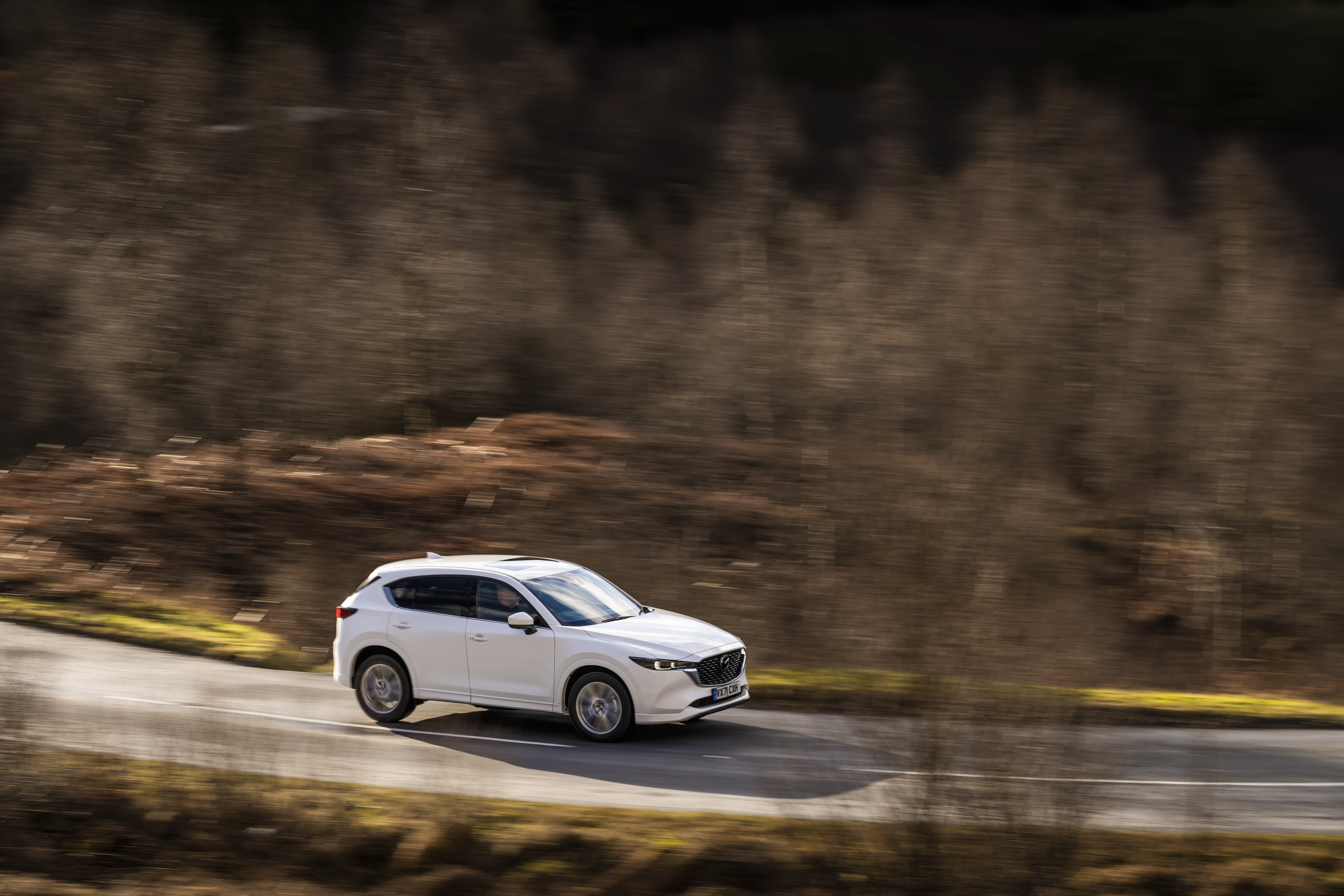 White Mazda CX-5 Skyactiv-D AWD GT Sport driving on a road HD Wallpaper