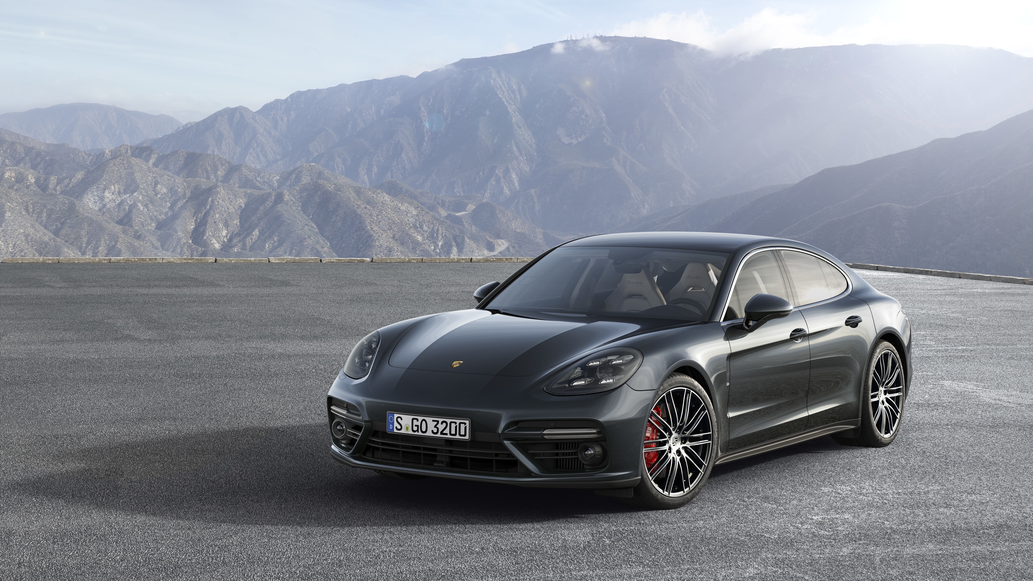 Porsche Panamera car on asphalt road with mountains HD Wallpaper