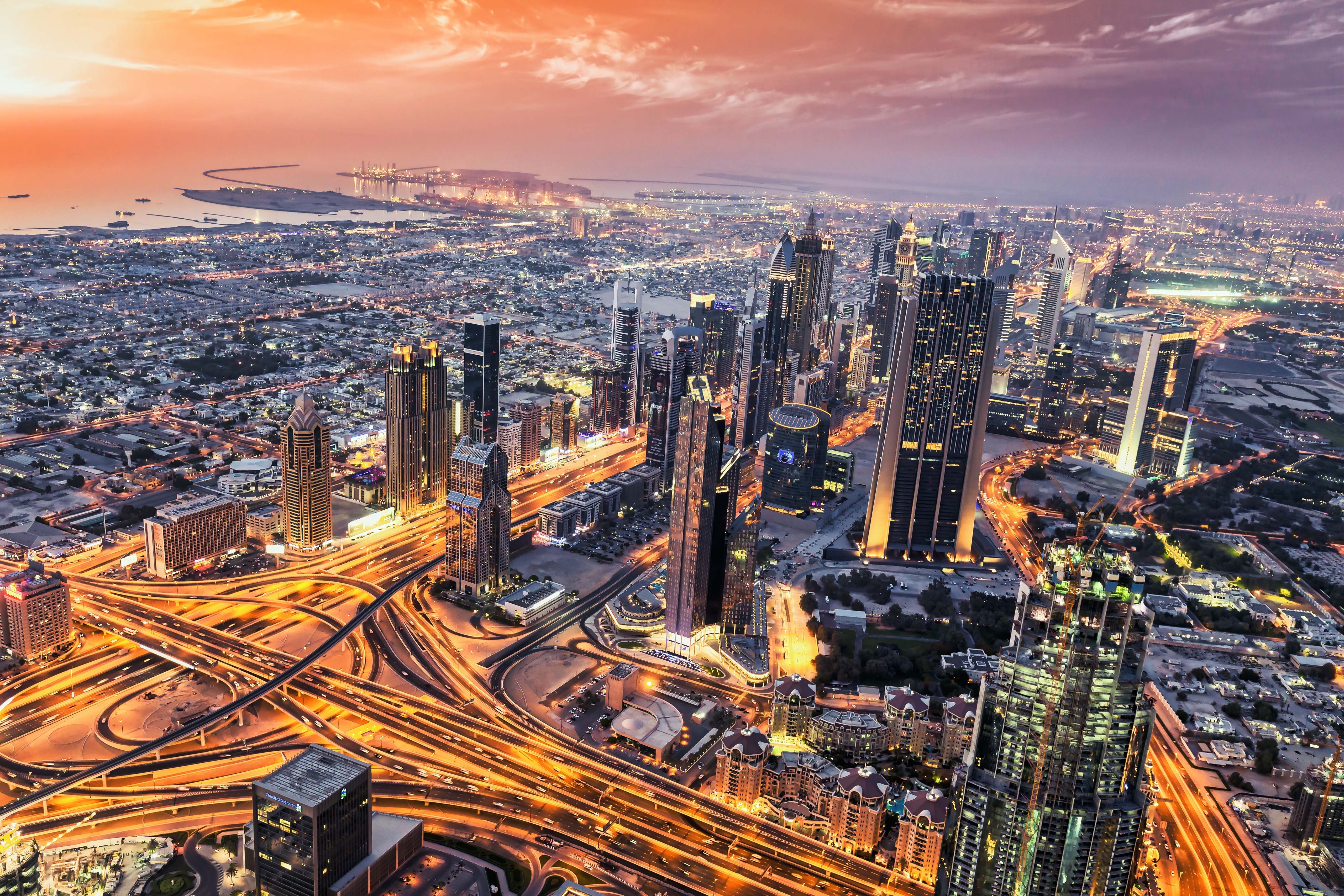 Dubai Cityscape with Highways at Sunset HD Wallpaper