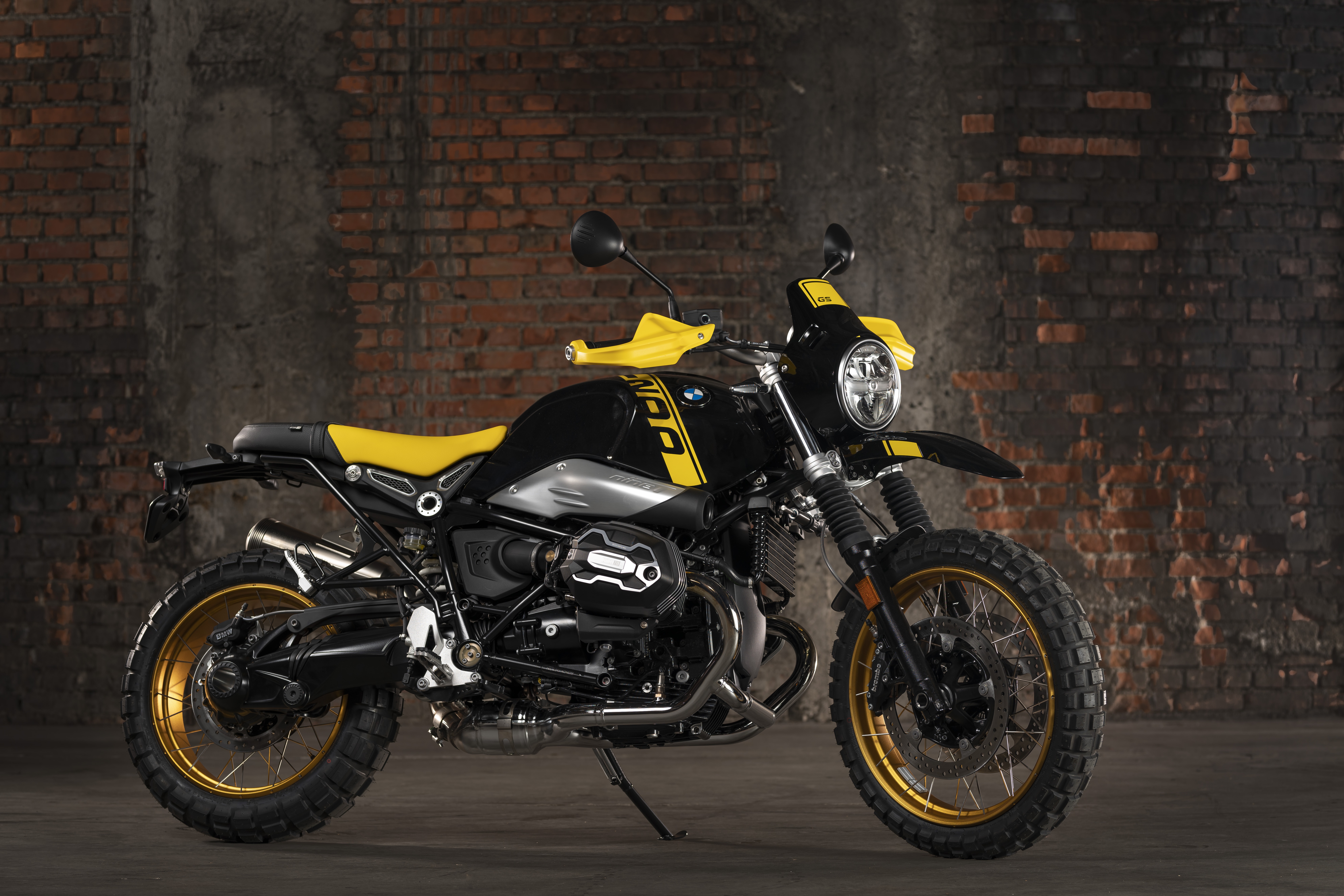 BMW R NineT motorcycle with yellow accents HD Wallpaper