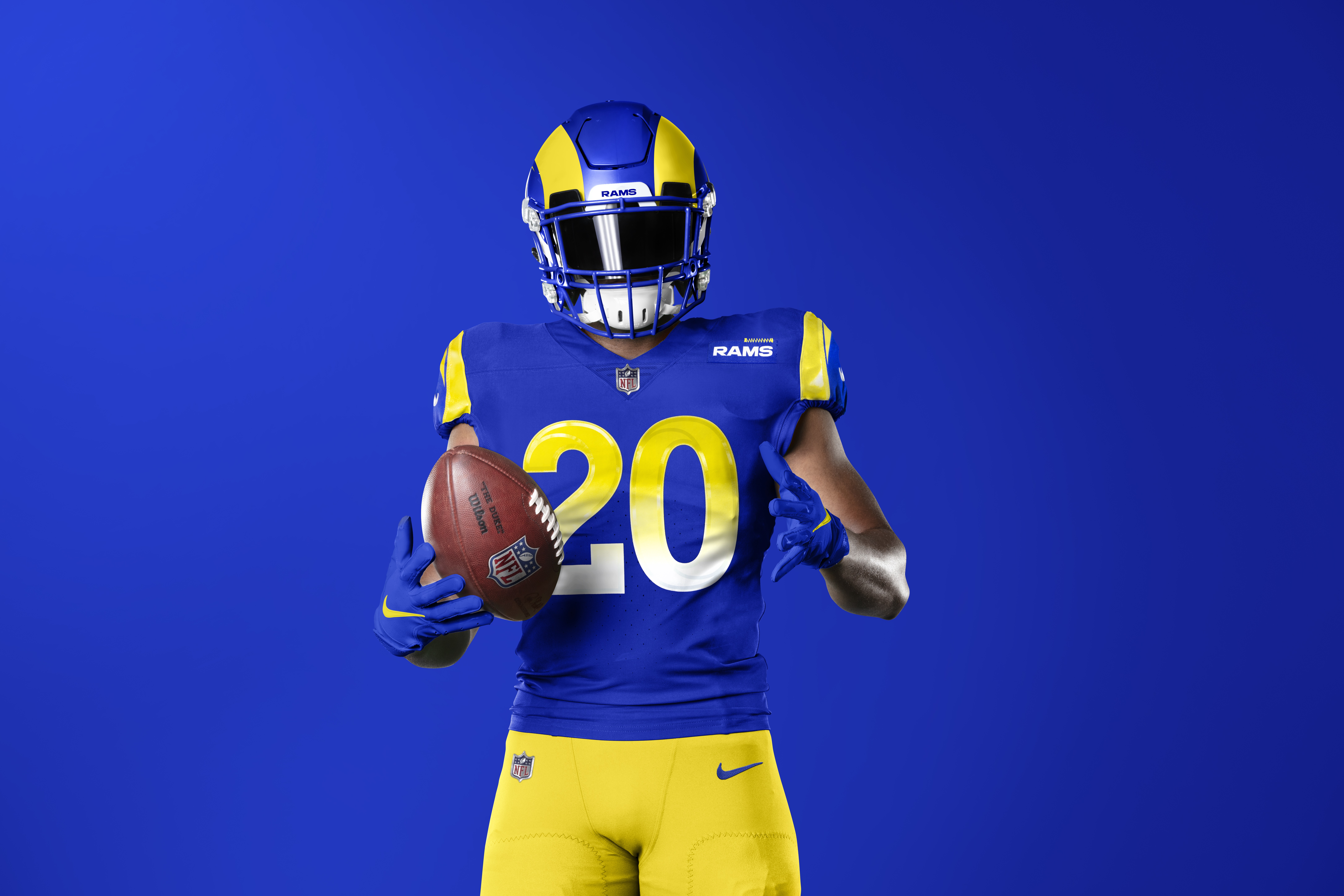 Los Angeles Rams player with football HD Wallpaper