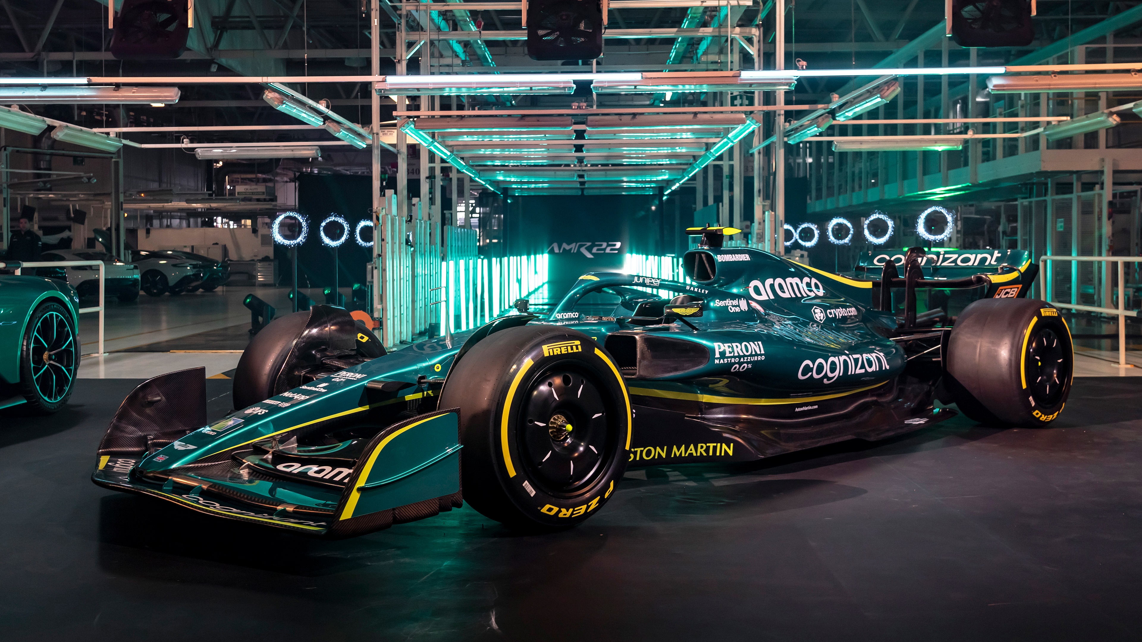 Aston Martin AMR22 Formula 1 car in a factory HD Wallpaper