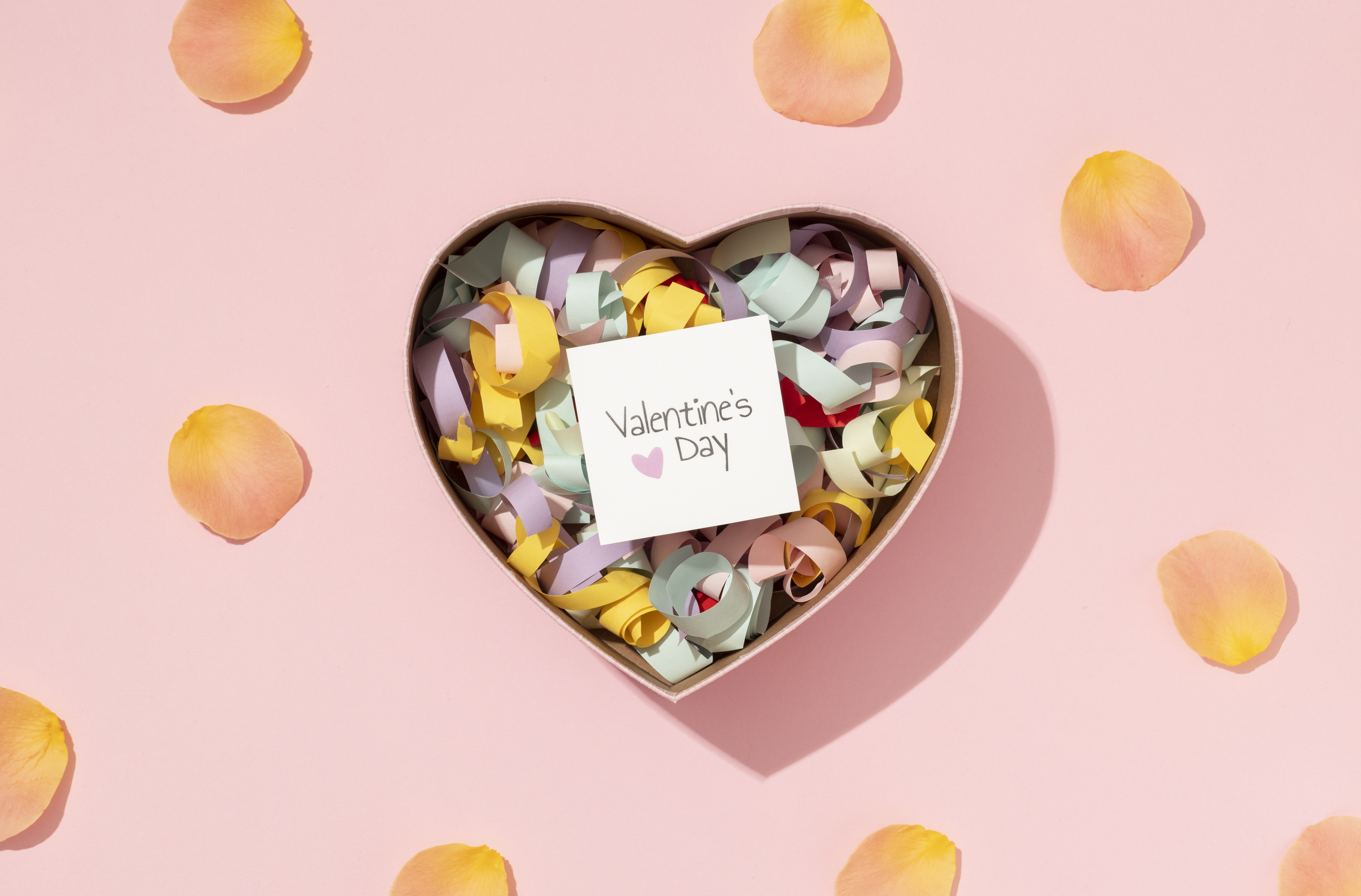Heart-shaped box with confetti and Valentine's Day card HD Wallpaper