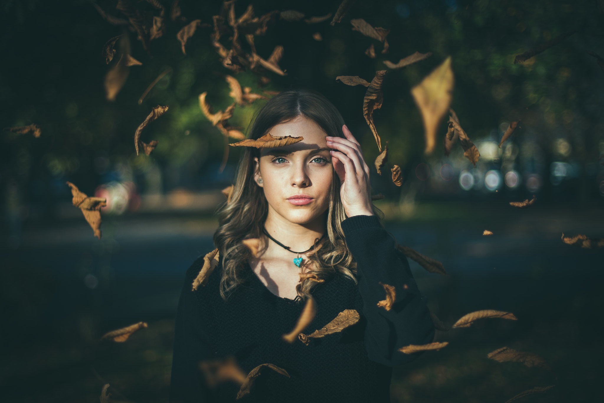Woman with falling leaves HD Wallpaper