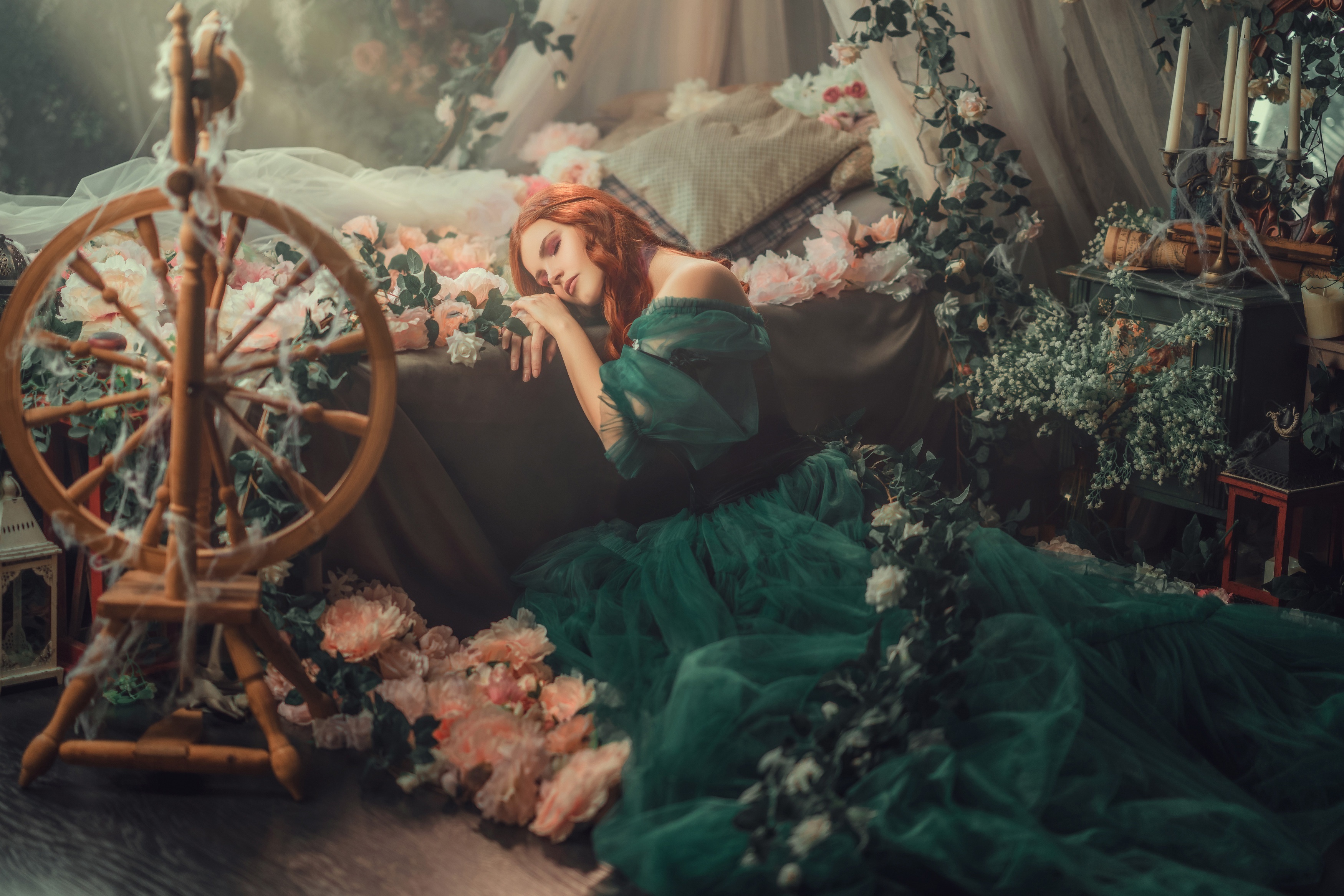 Redhead in a green dress by a spinning wheel HD Wallpaper