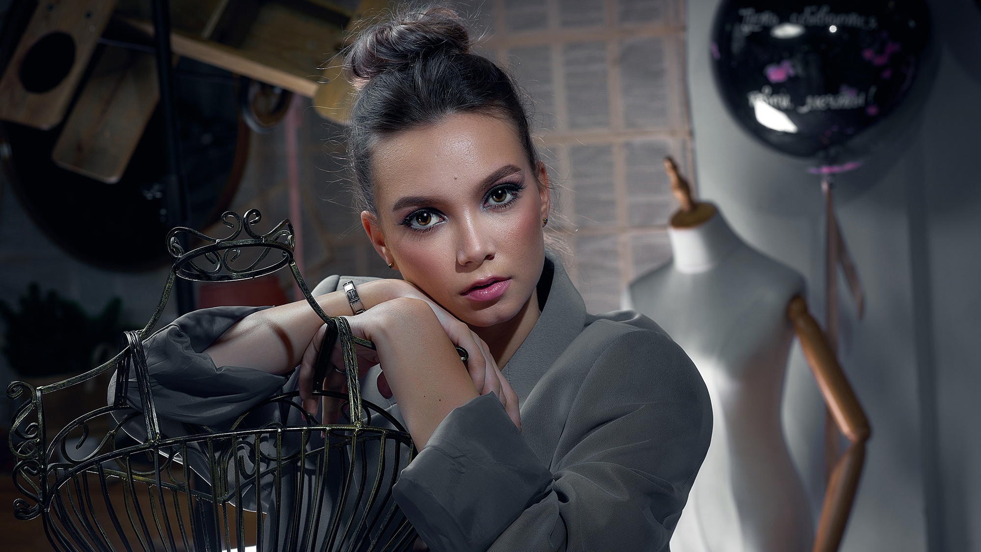 Model with dark hair in a bun HD Wallpaper