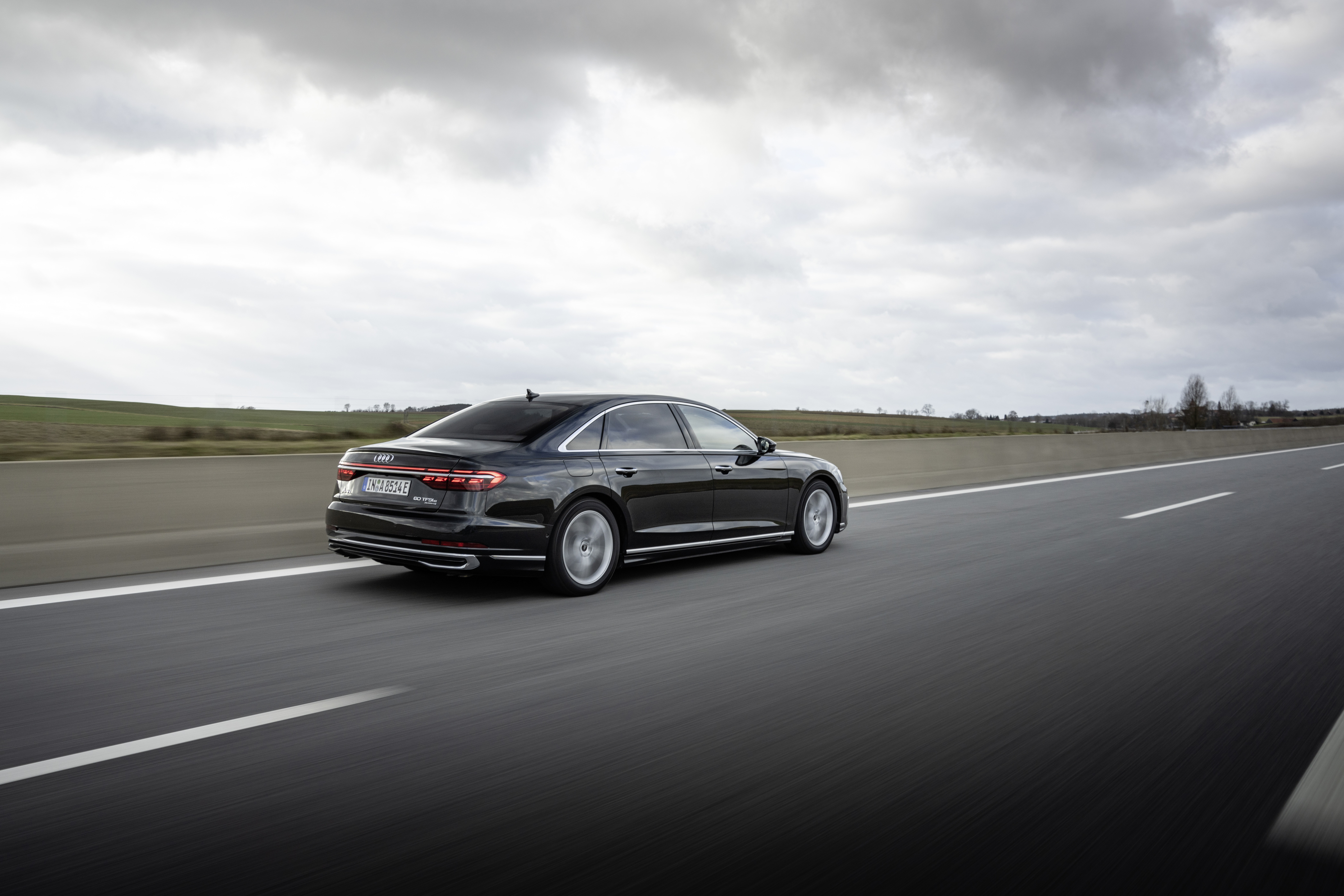 Audi A8 L 60 TFSI e quattro S line on highway HD Wallpaper