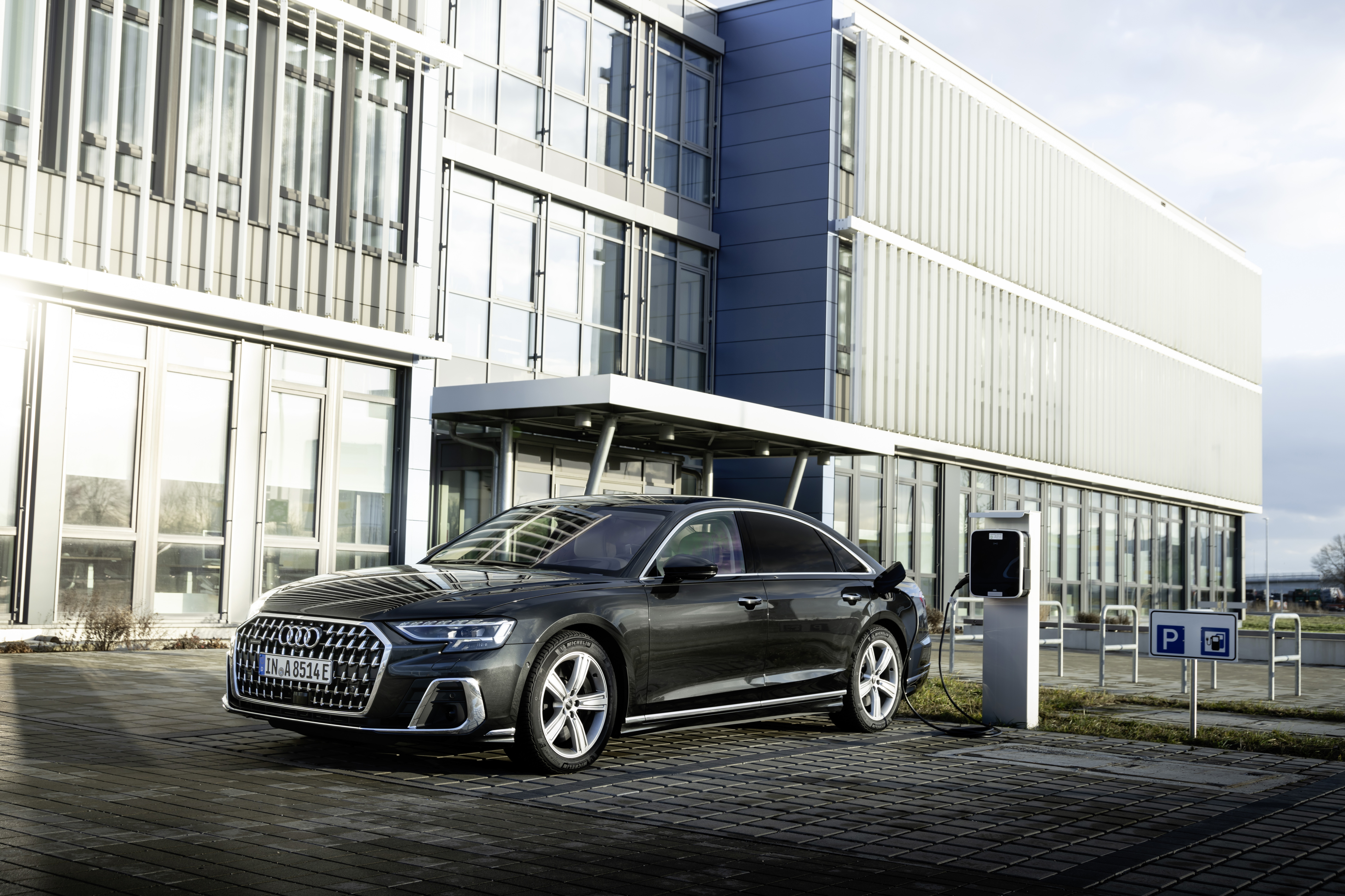 Audi A8 L 60 TFSI e quattro S line charging HD Wallpaper
