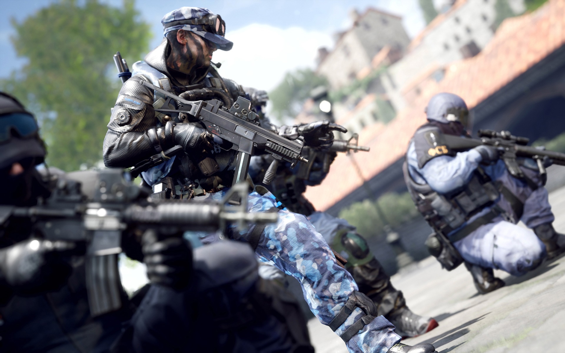 Soldiers with rifles in a tactical formation HD Wallpaper