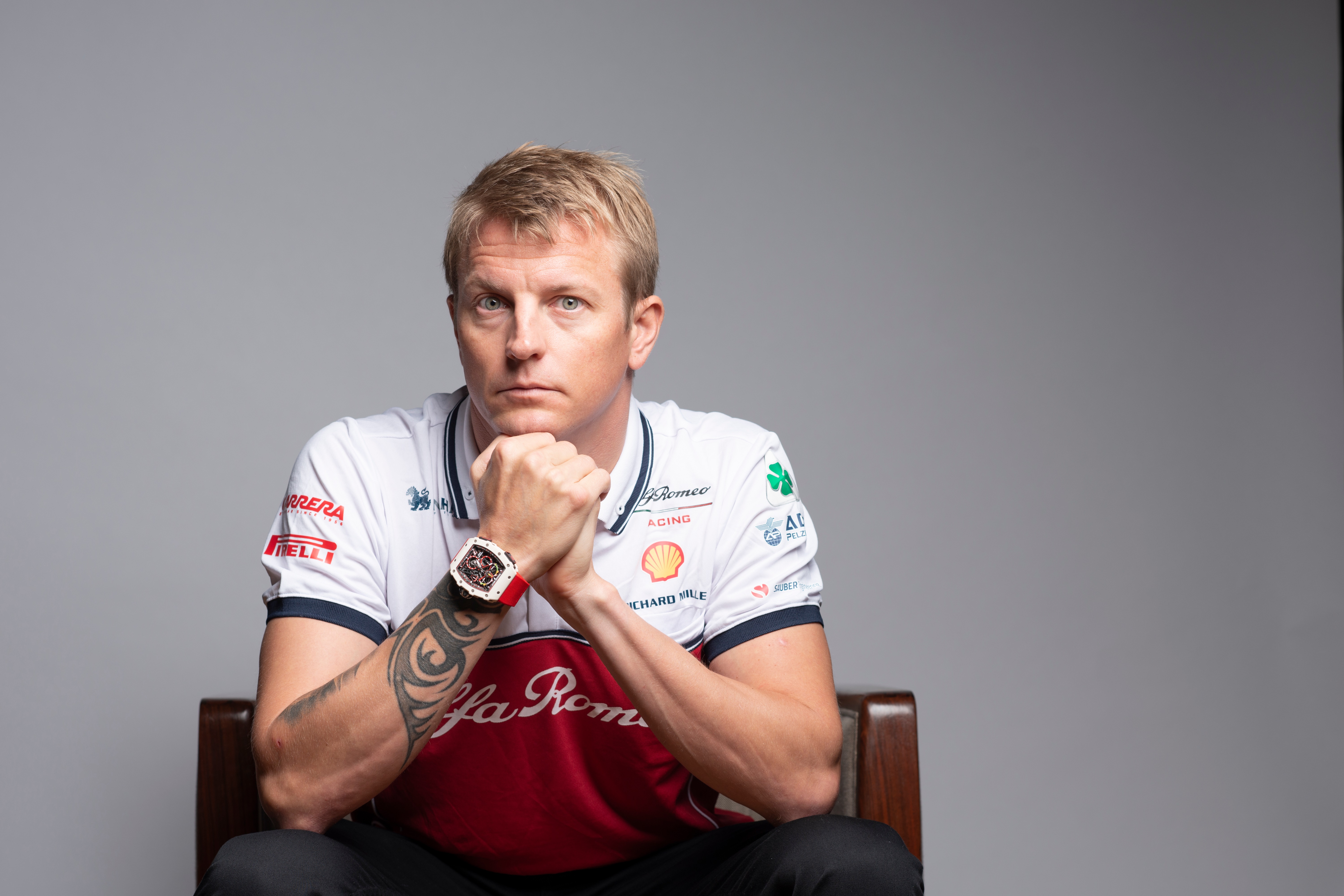 Kimi Räikkönen in Alfa Romeo racing attire HD Wallpaper