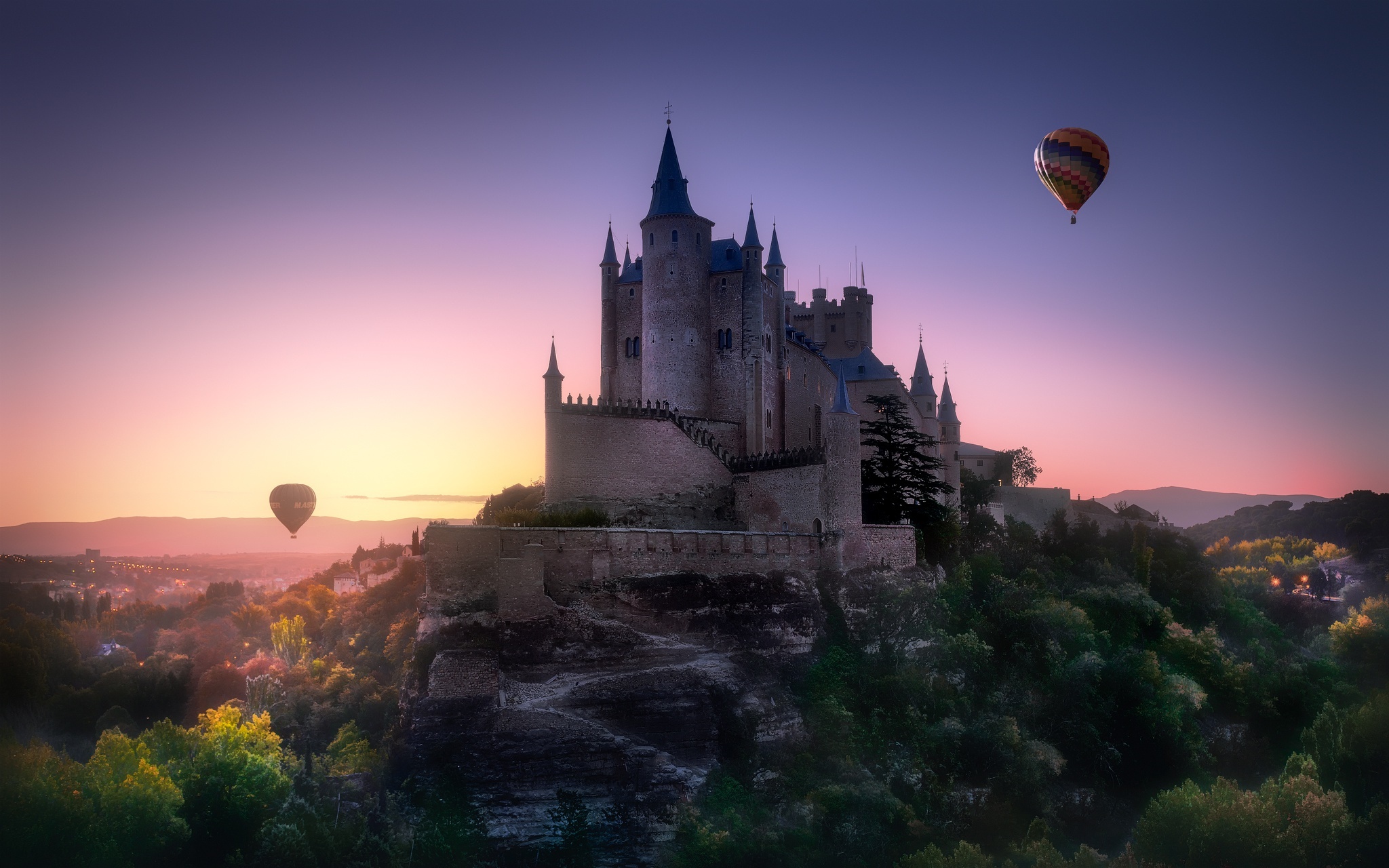 Castle and hot air balloons at sunset HD Wallpaper