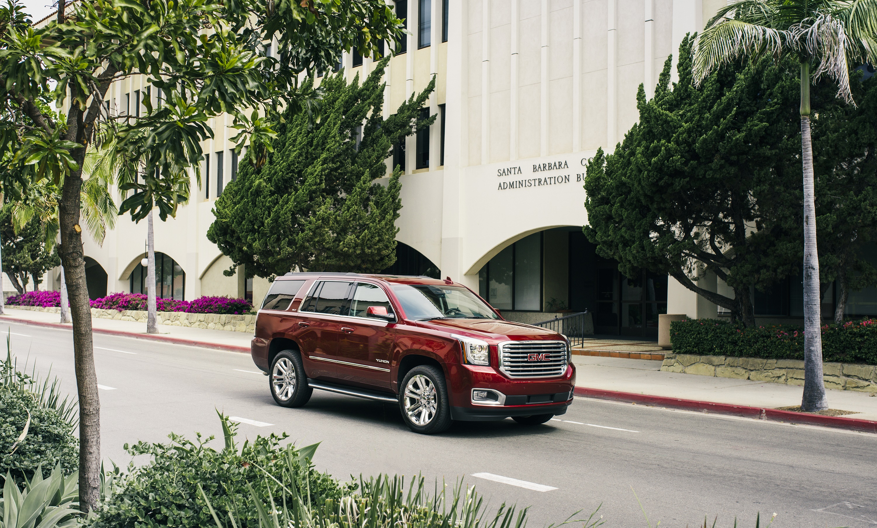 Red GMC Yukon Denali HD SUV on Street HD Wallpaper