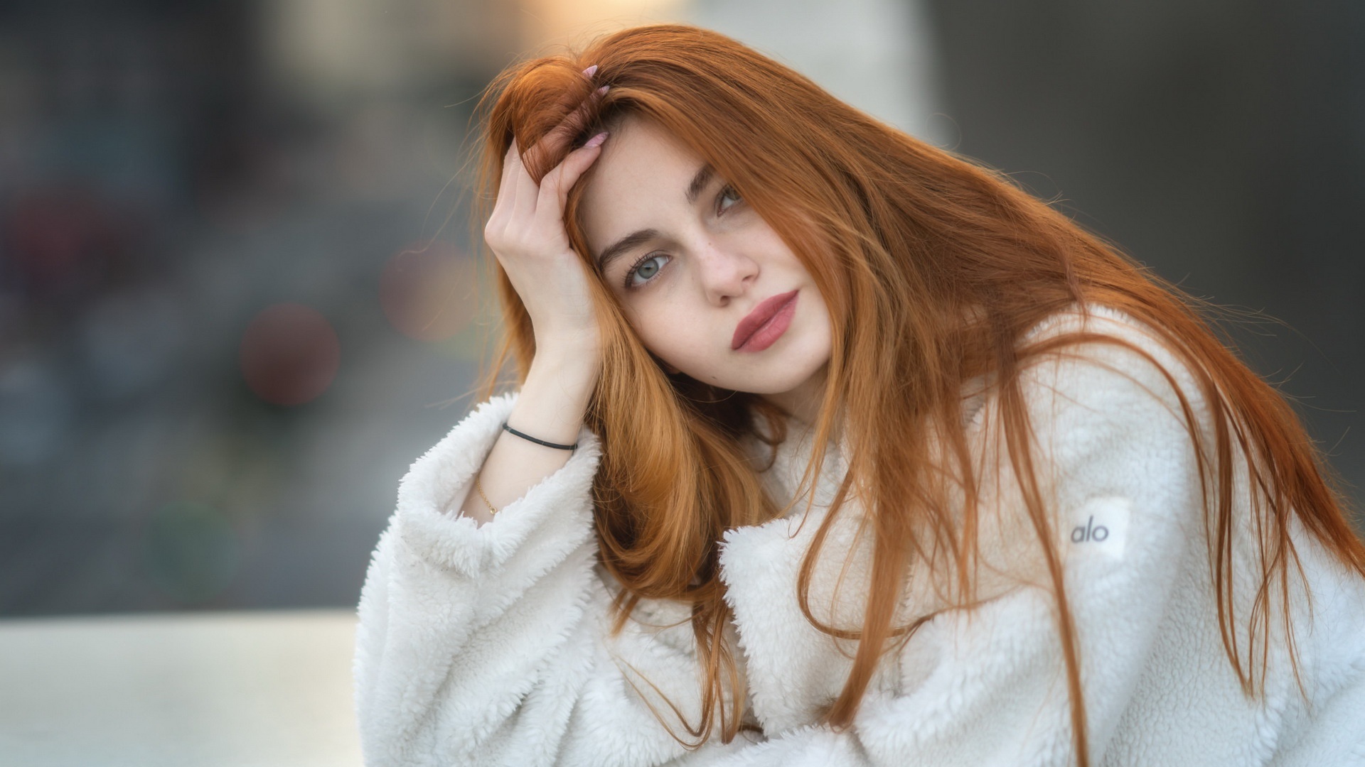 Redhead woman with hand on head HD Wallpaper