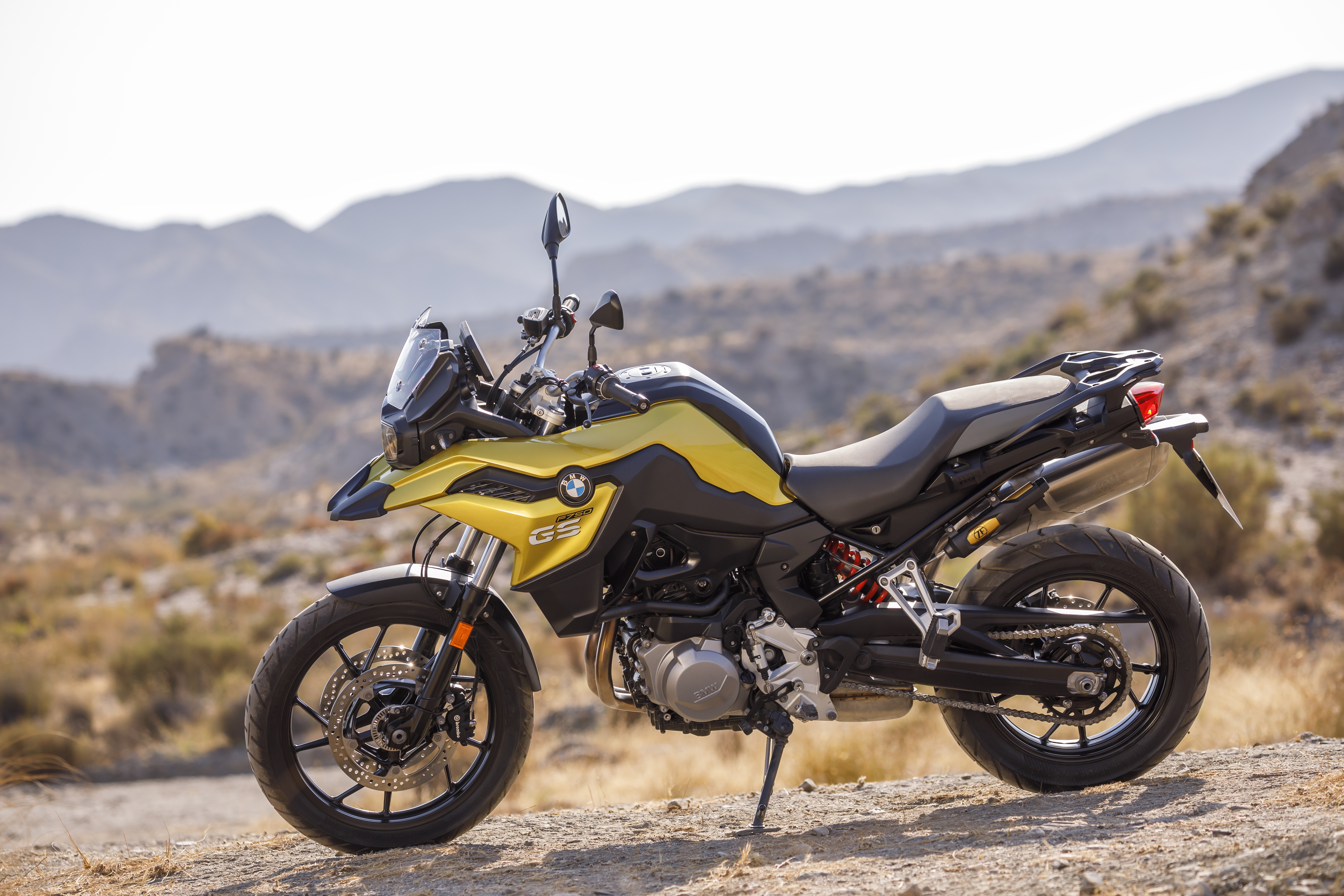 BMW F 750 GS motorcycle in a desert landscape HD Wallpaper