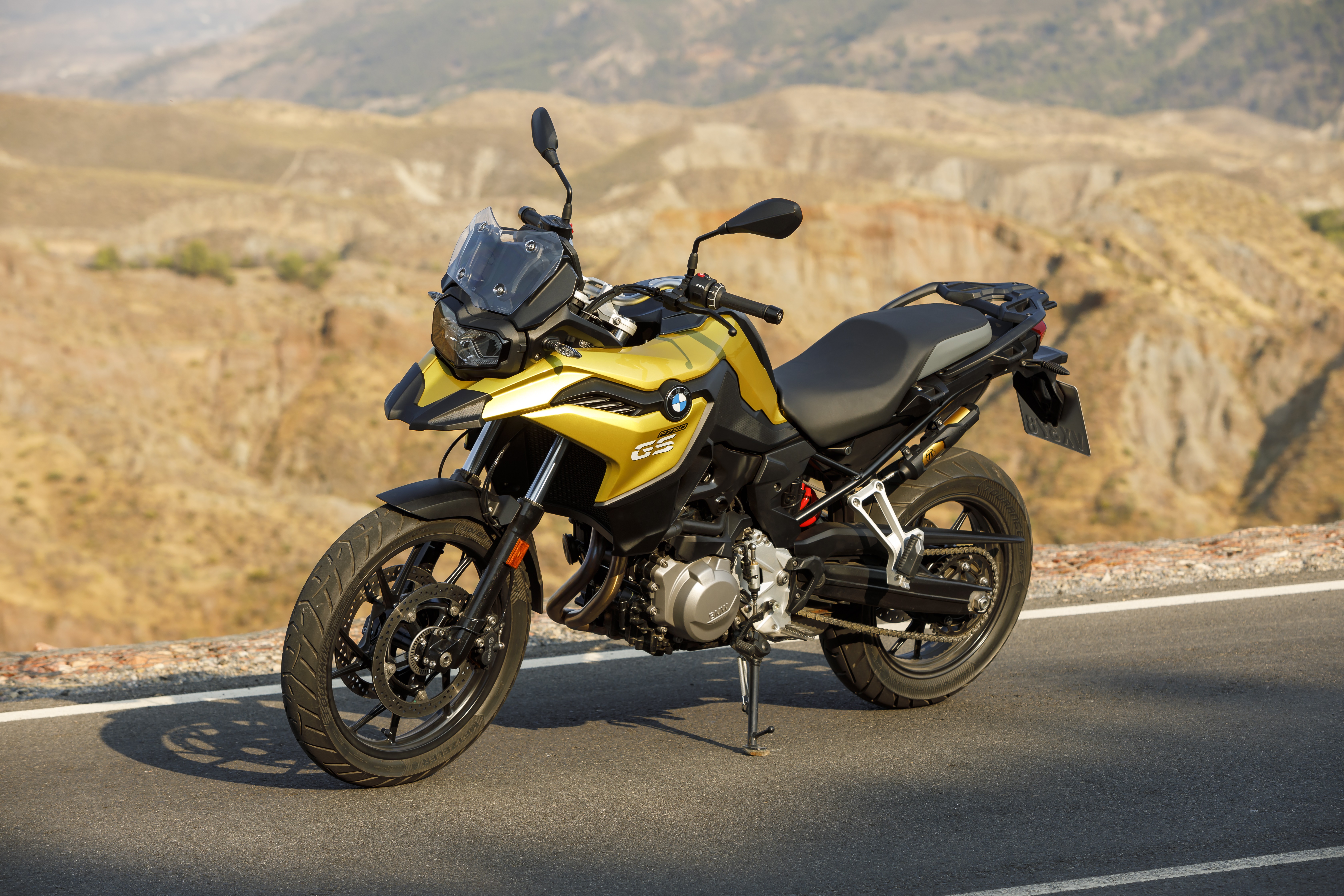 BMW F 750 GS motorcycle in a desert landscape HD Wallpaper