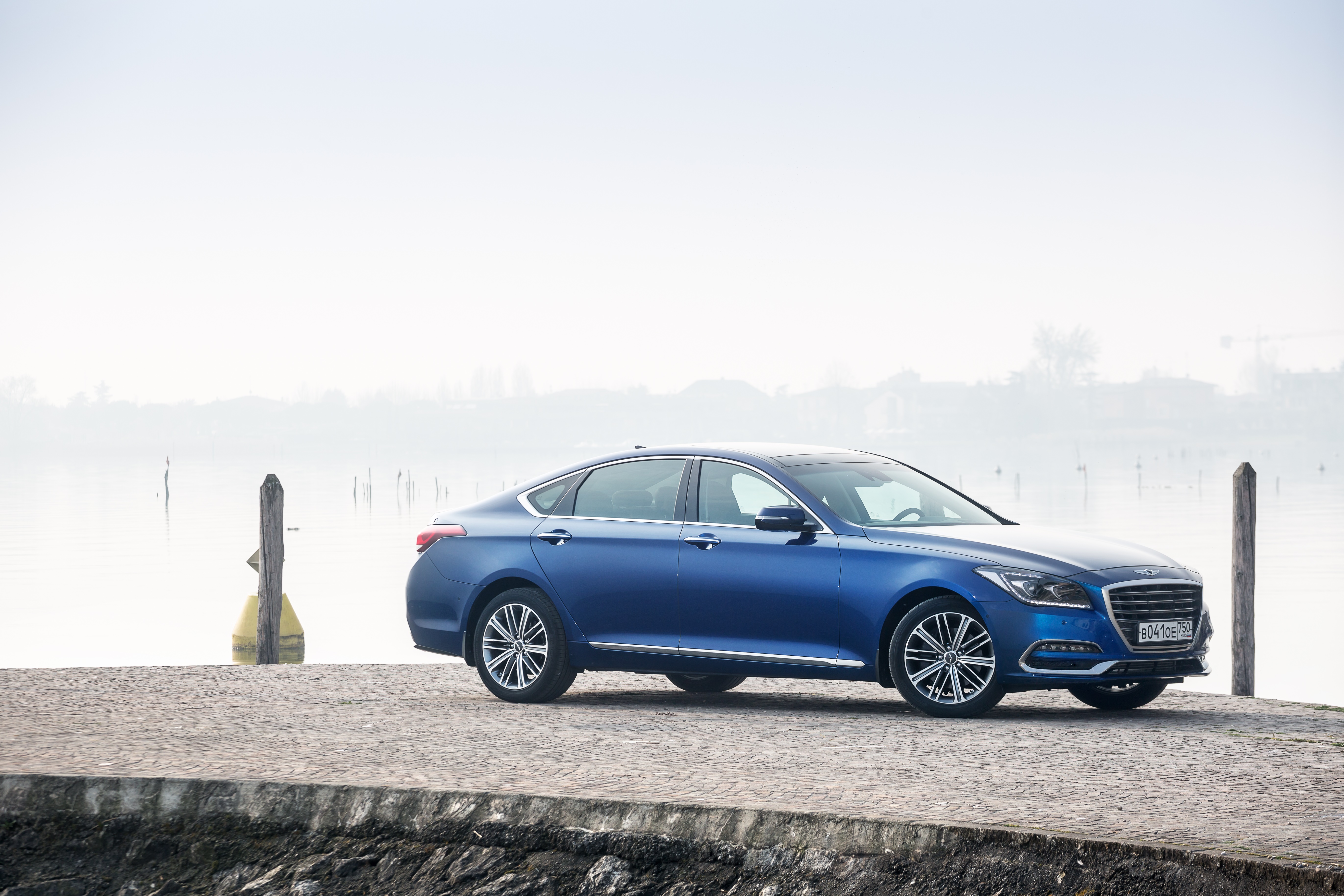 Blue Genesis G80 Sedan on a Pier HD Wallpaper