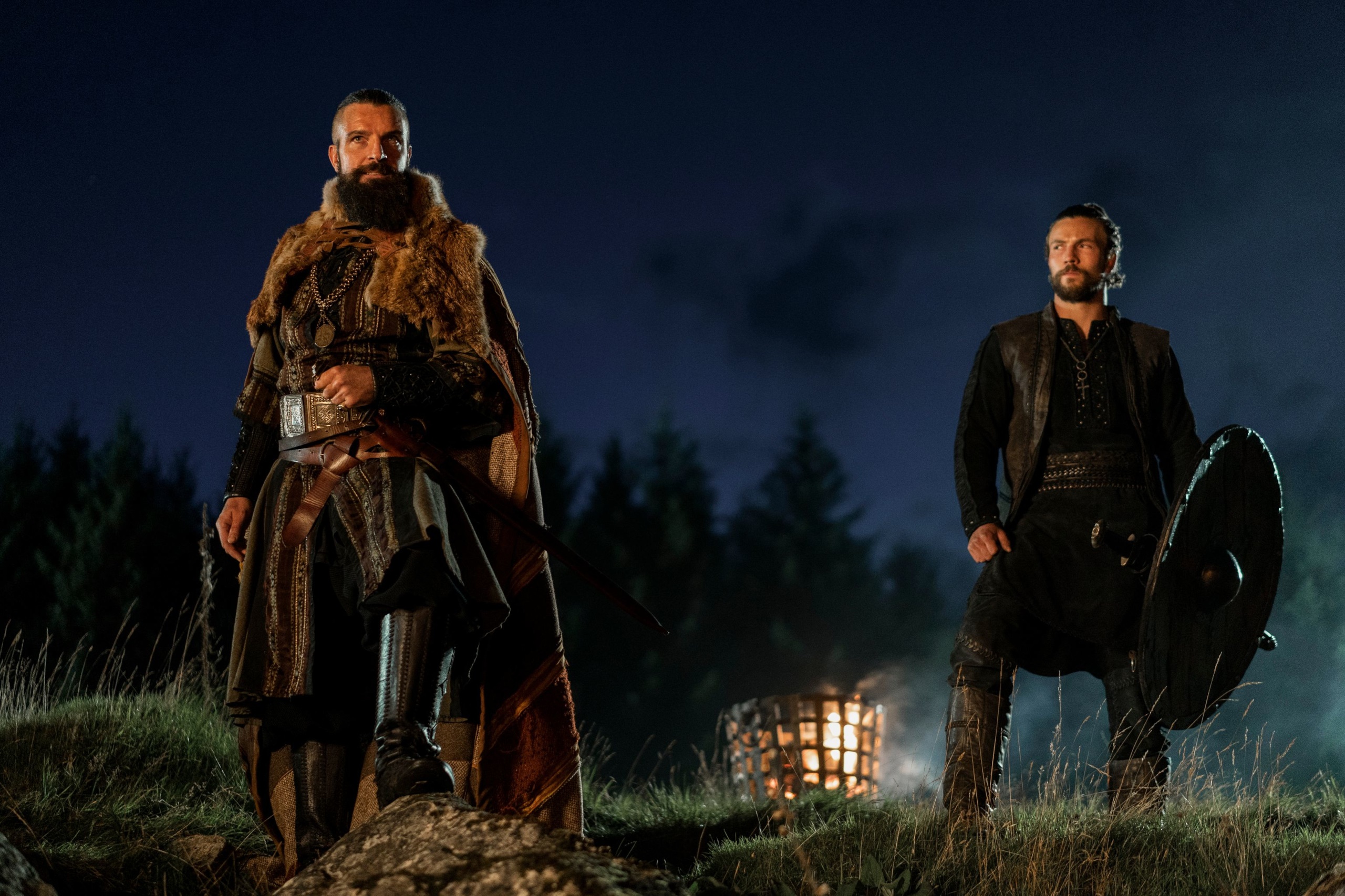 Two warriors in a forest at night HD Wallpaper