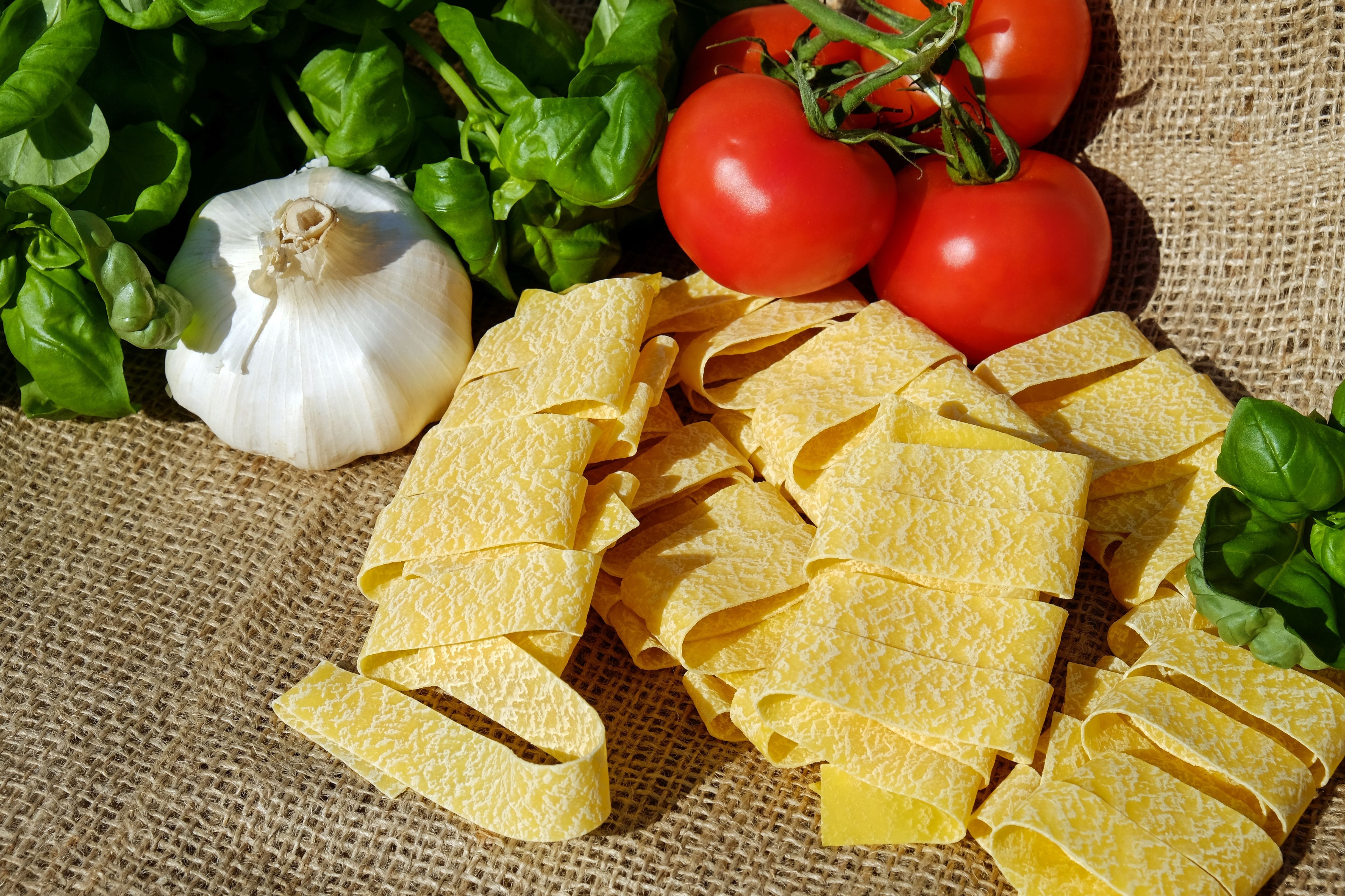 Fresh Pasta Ingredients with Tomatoes and Basil HD Wallpaper